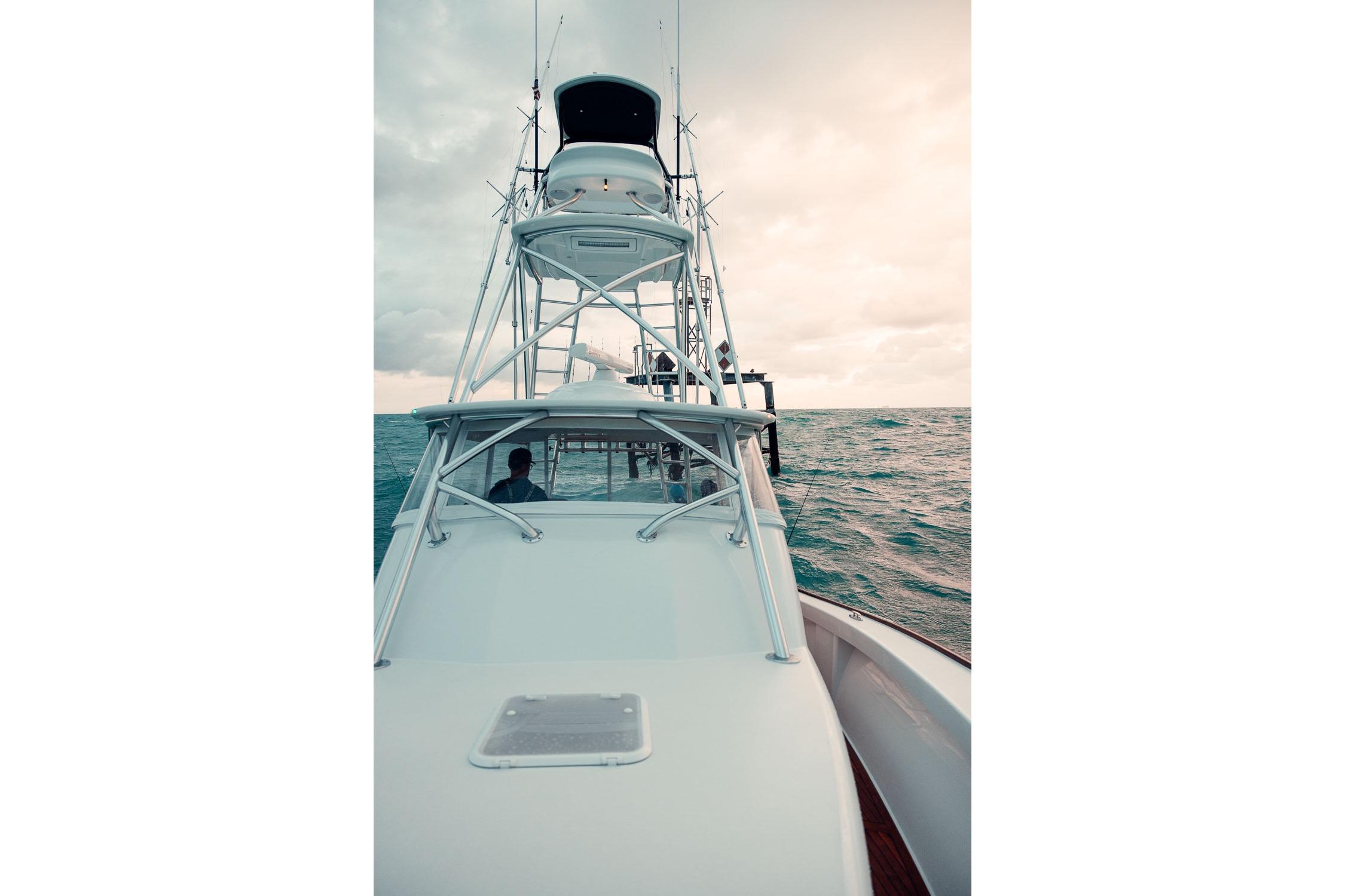 2026 Release Boatworks 46 Walkaround on open sea under cloudy sky.