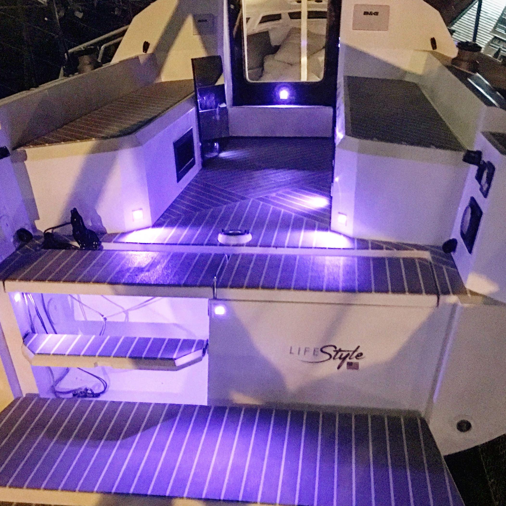 2025 Faro Yachts 29 with illuminated deck and modern interior design.