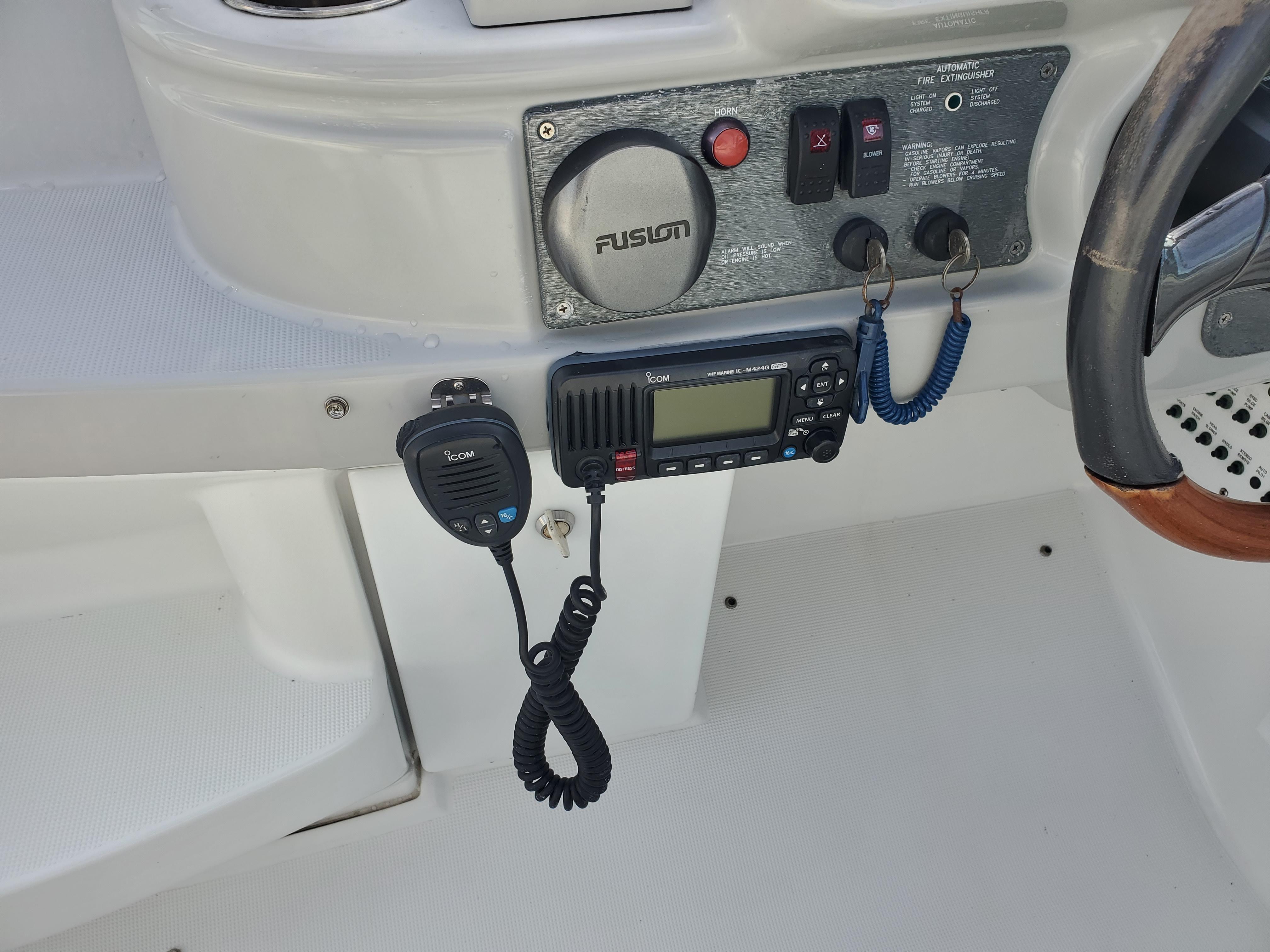 2004 Formula 370 Super Sport boat dashboard with radio and controls.