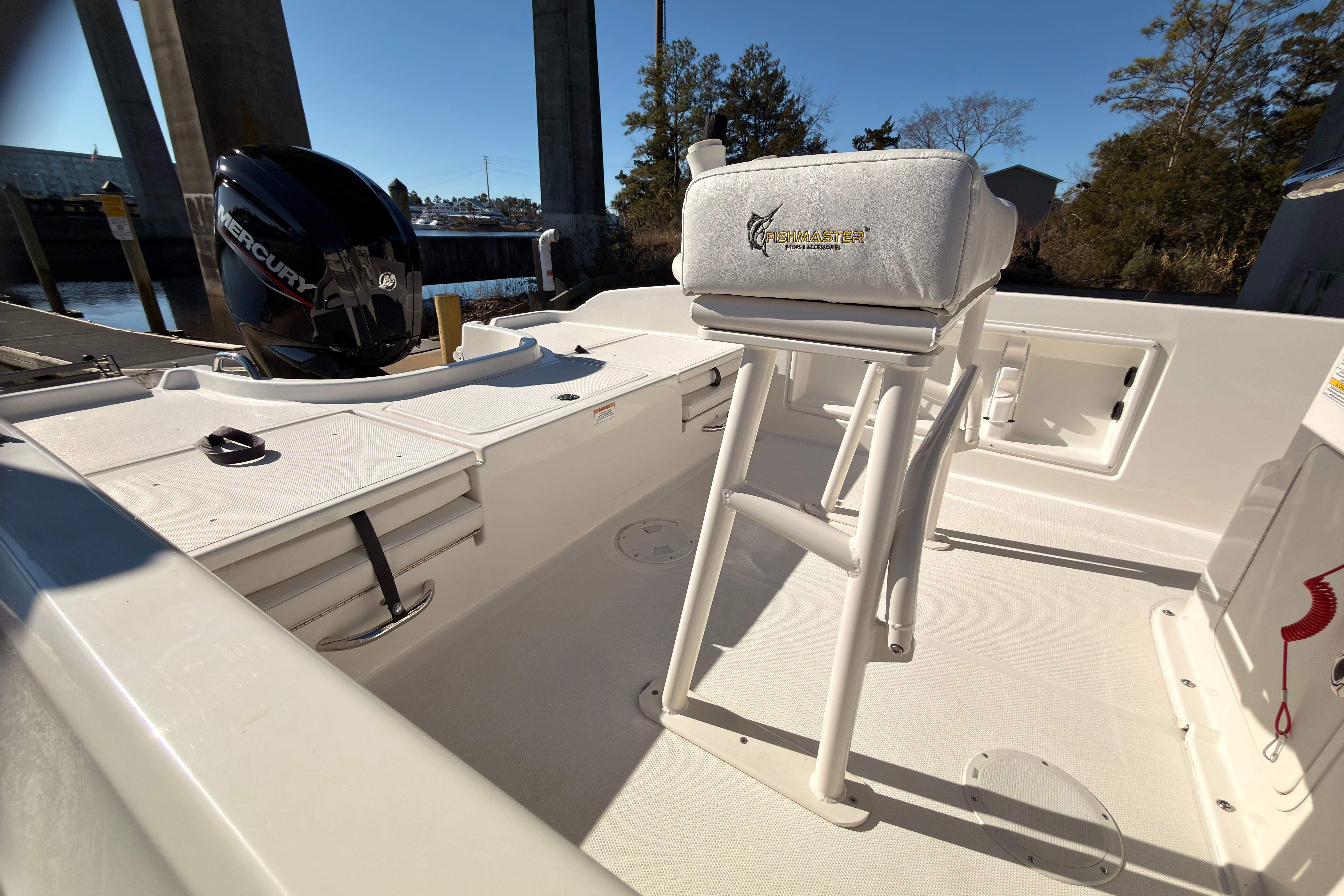 2023 Trophy T-18 boat interior with Fishmaster seat and Mercury engine.
