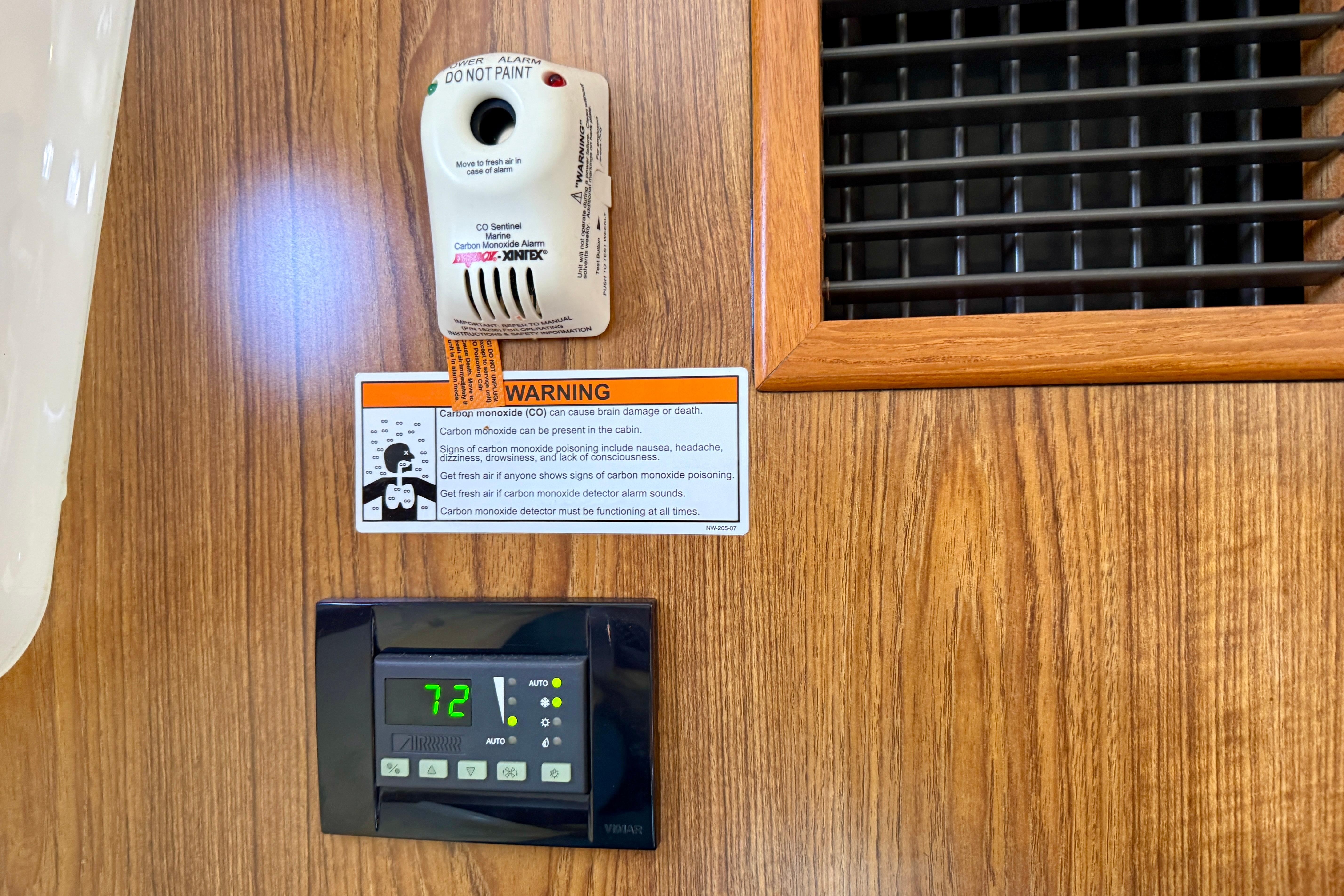 Carbon monoxide alarm and thermostat on Pursuit OS 345 Offshore boat, 2012 model.