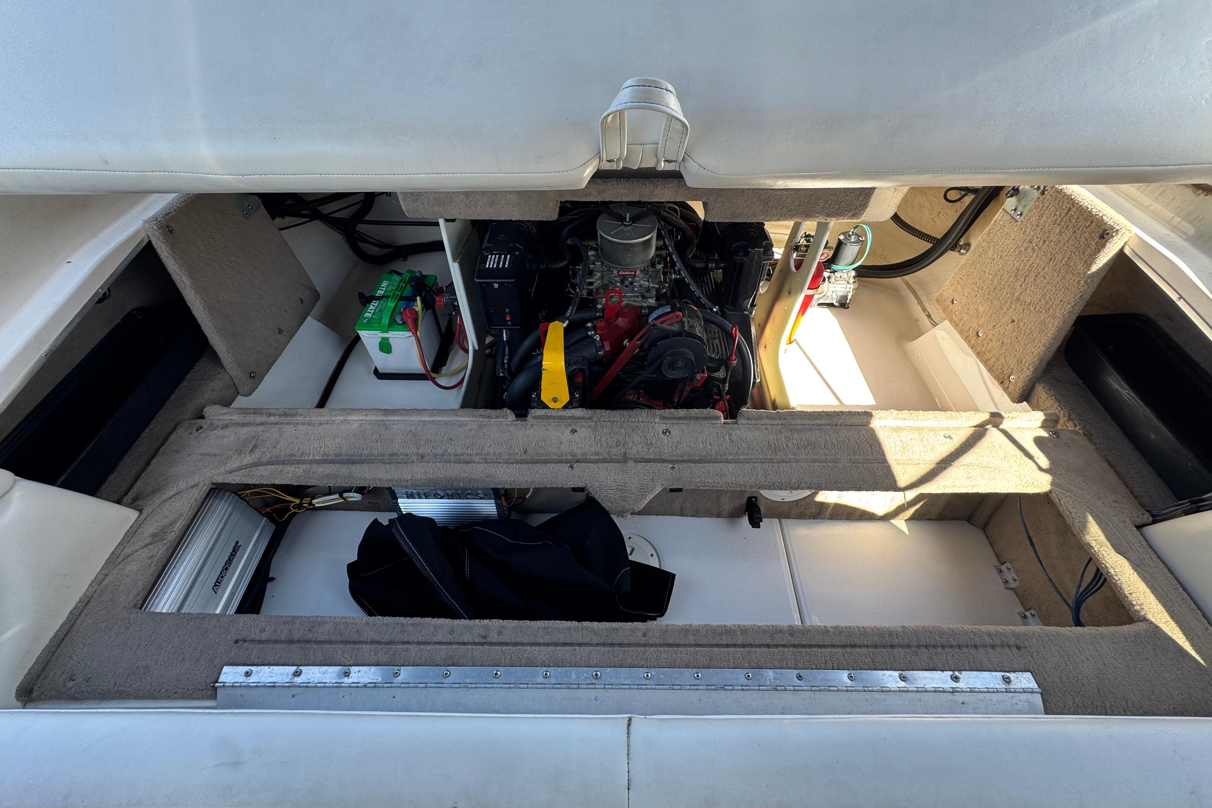 Engine compartment of a 2002 Chaparral 186 SSi boat, showcasing internal components.