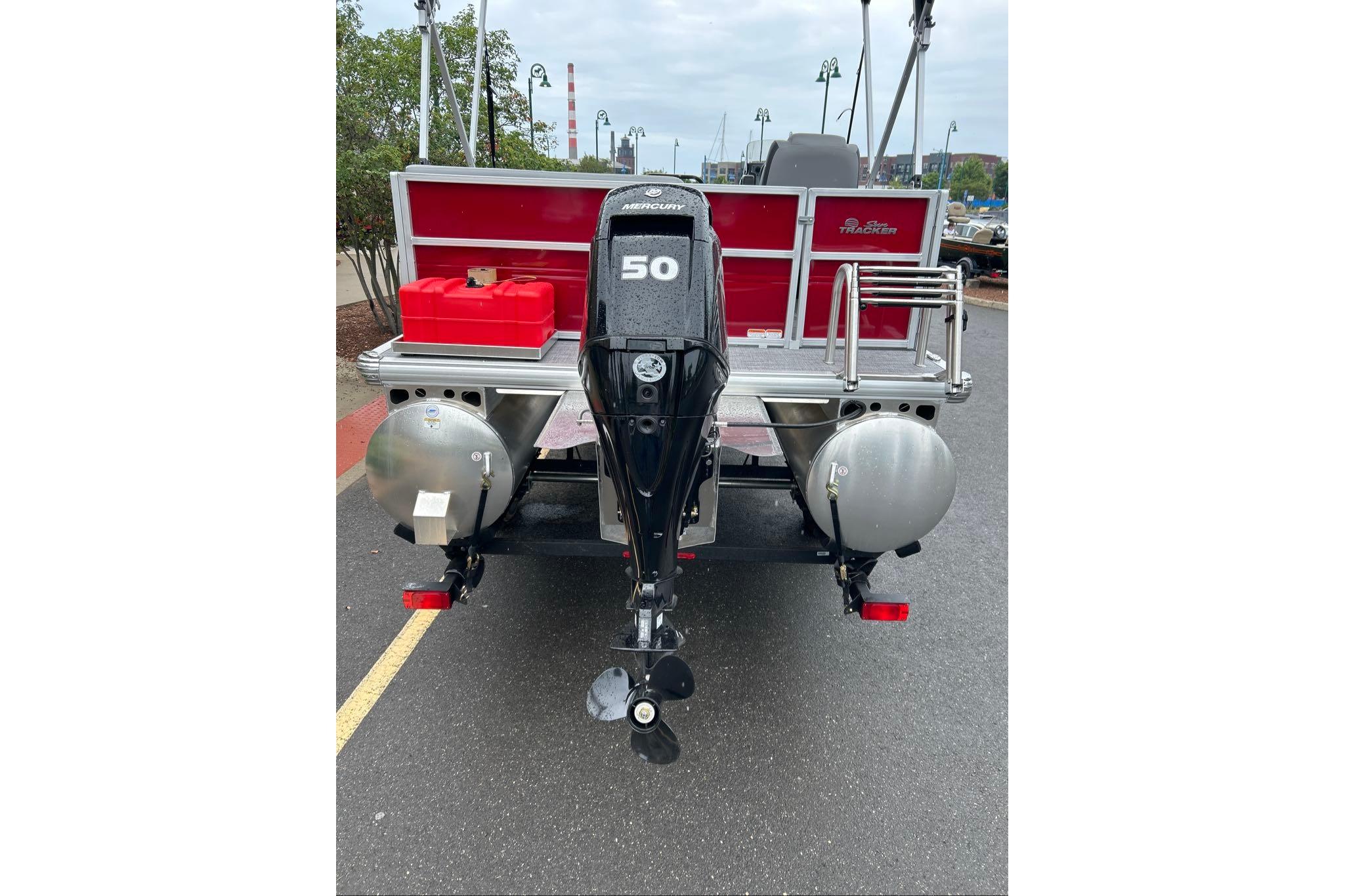 2026 Sun Tracker Party Barge 16 DLX with Mercury 50 engine, rear view.