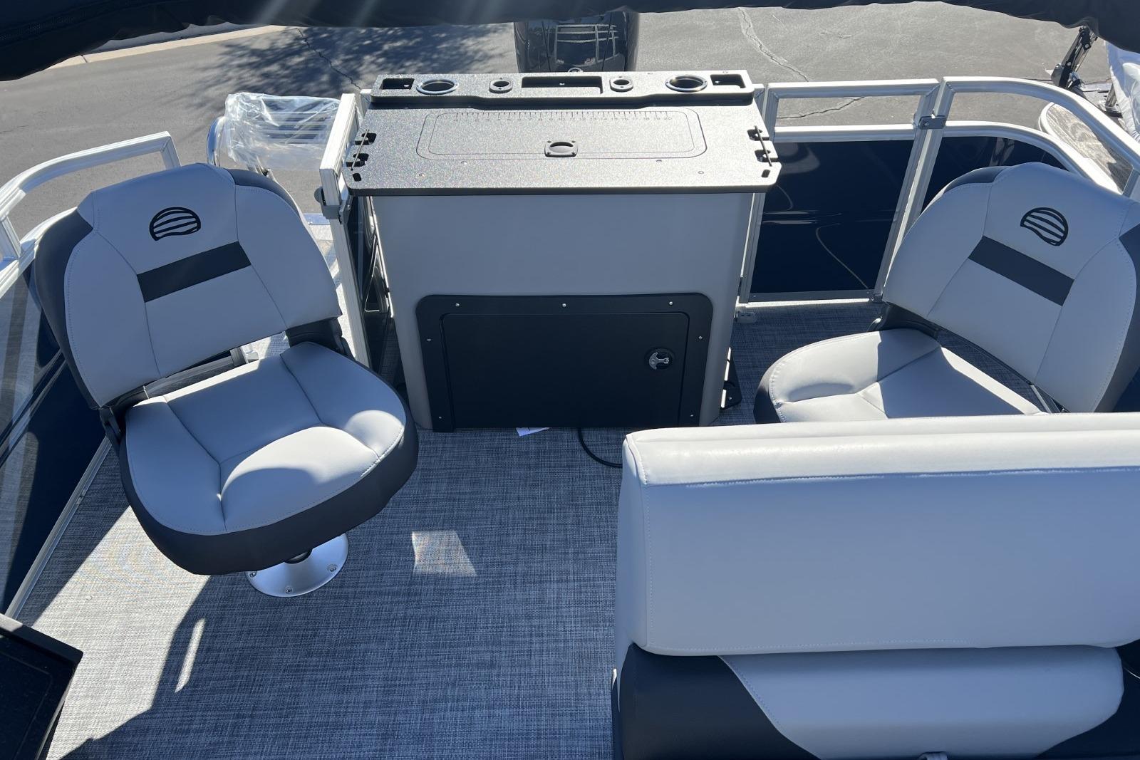2026 Sun Tracker SportFish 22 DLX interior with seating and console.