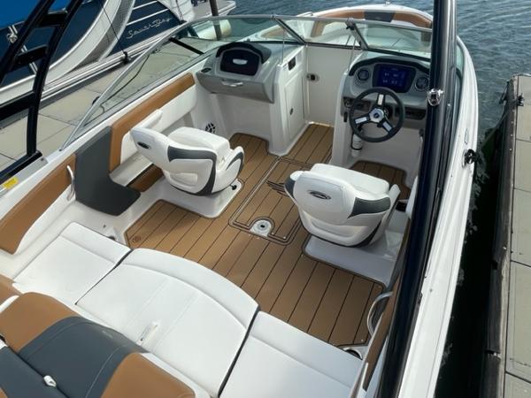 2025 Chaparral 21 SSi boat interior with modern seating and dashboard.