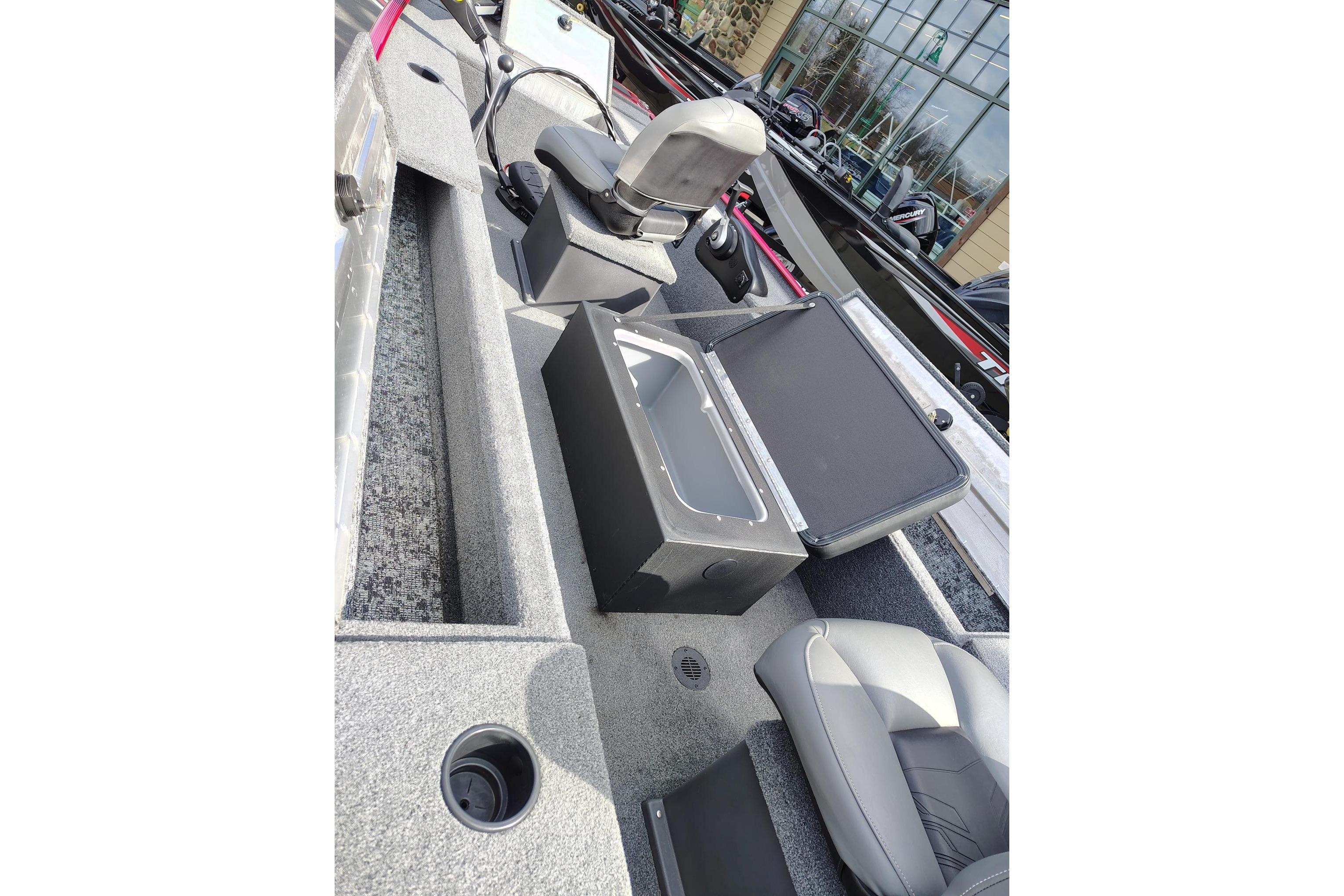2025 Tracker Panfish 17 boat interior with seating and storage compartments.