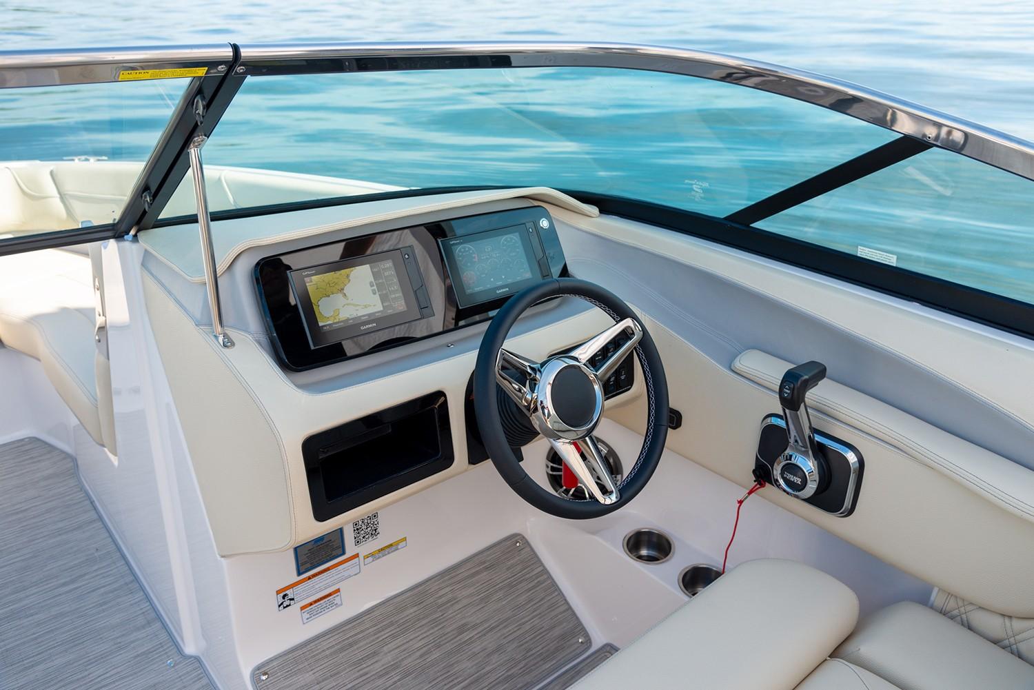 Manufacturer Provided Image: 2020 Regal LS6 boat dashboard with steering wheel and navigation system.
