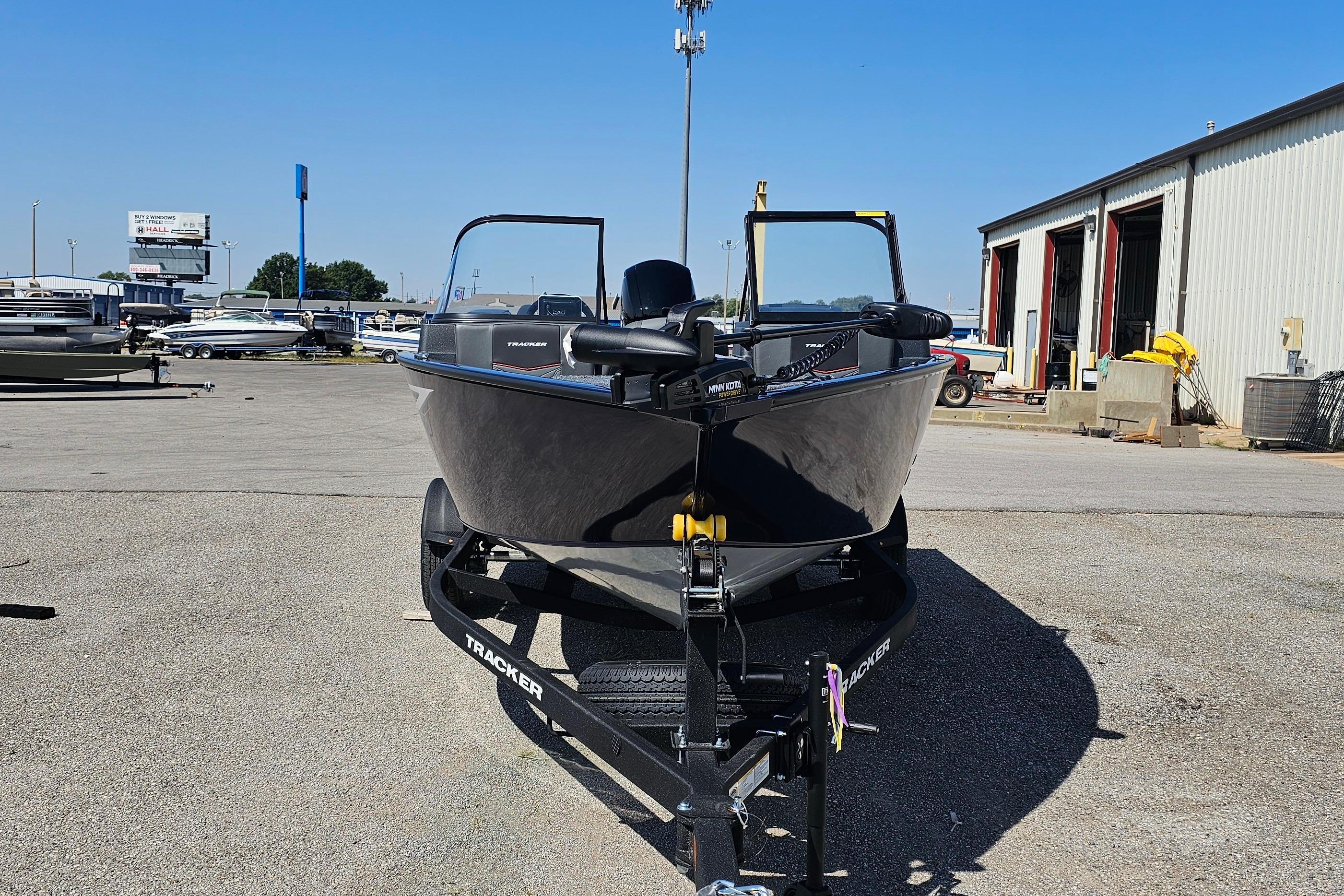 2026 Tracker Pro Guide V-175 Combo boat on trailer in outdoor dealership lot.