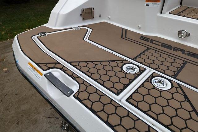 2017 Scarab 255 Platinum SE boat deck with hexagonal pattern and sleek design.