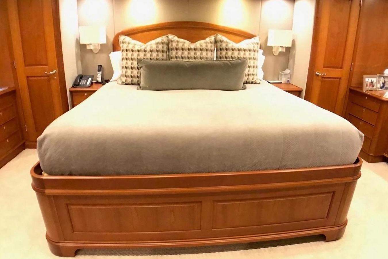 Luxurious bedroom interior of 2005 Pacific Mariner Raised Pilothouse Motor Yacht.