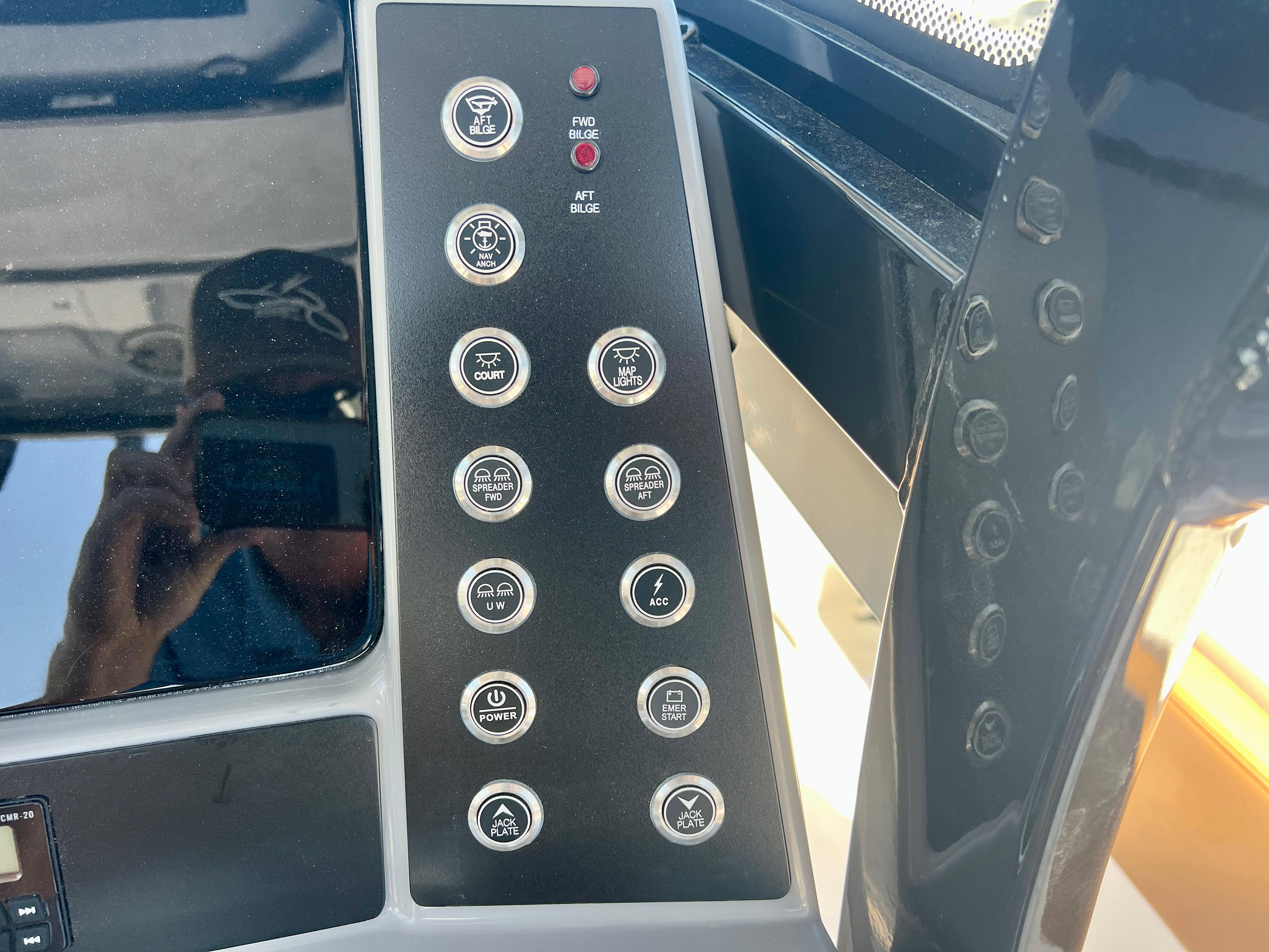 Control panel of 2025 Robalo 266 Cayman with various switches.