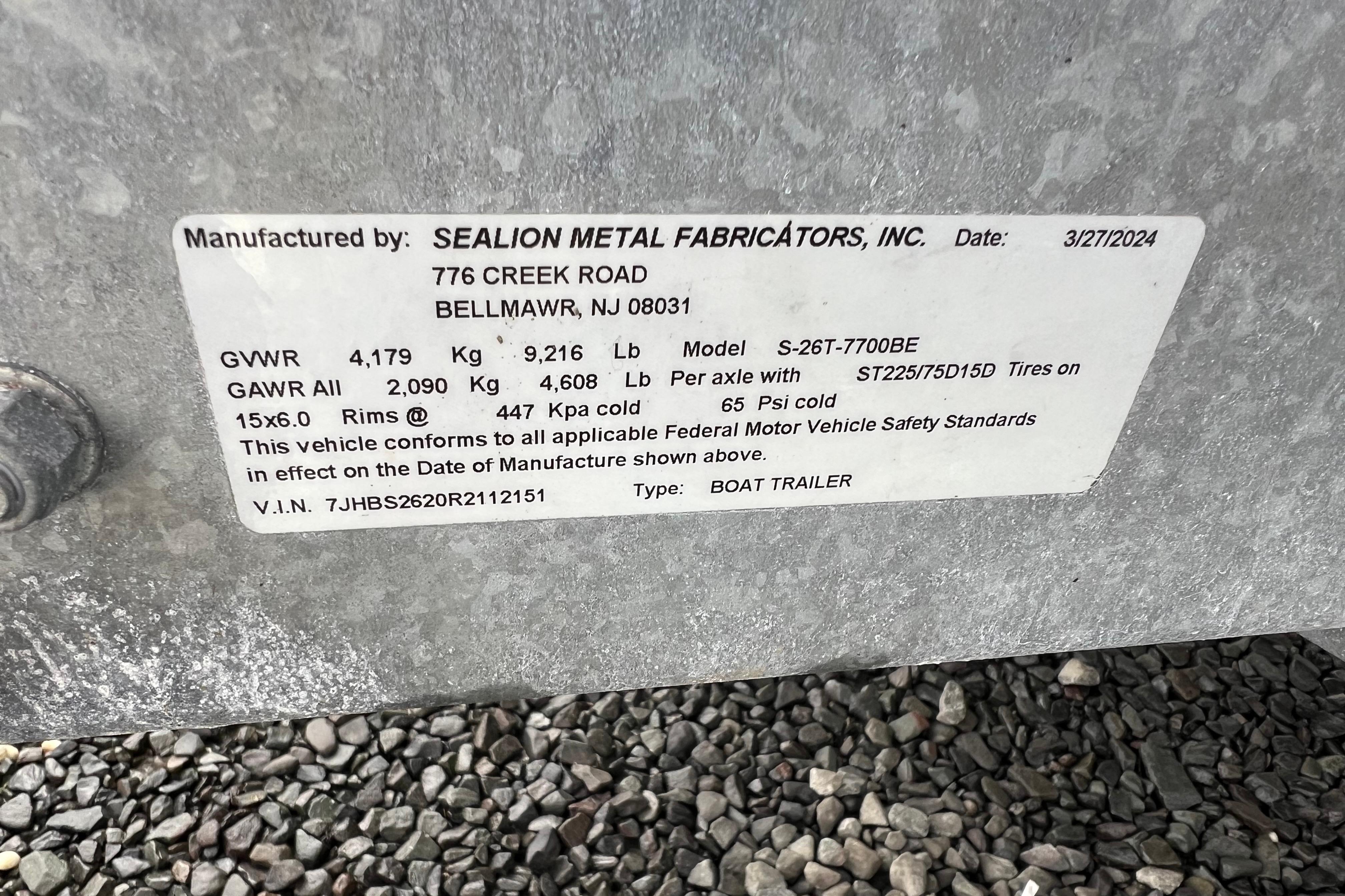 Label on Sealion Metal Fabricators boat trailer, model S-26T-7700BE, manufactured 3/27/2024.