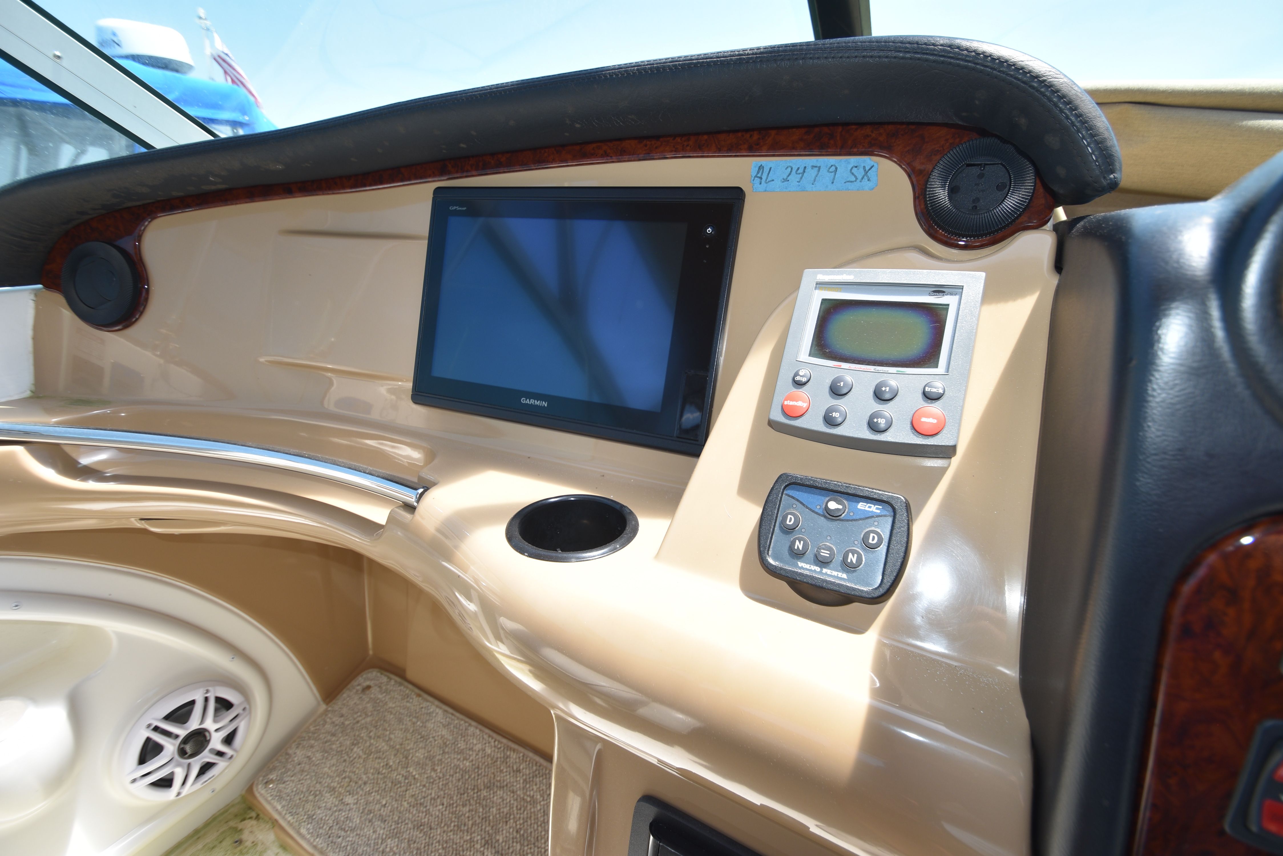 The cockpit of a 2004 Carver 466 Motor Yacht with controls and electronics.