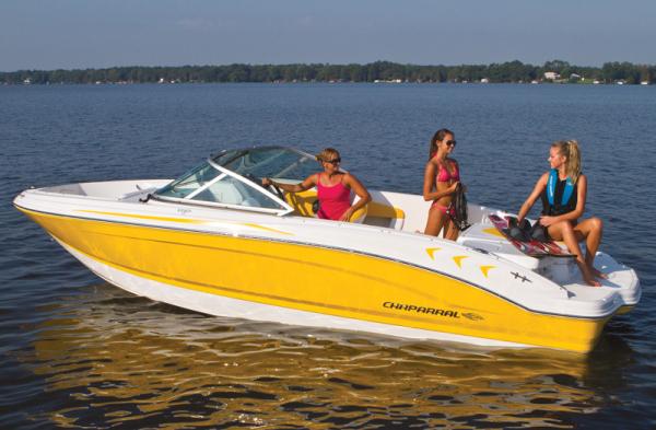 Manufacturer Provided Image: 2012 Chaparral 19 Sport H2O boat on a lake with three people.