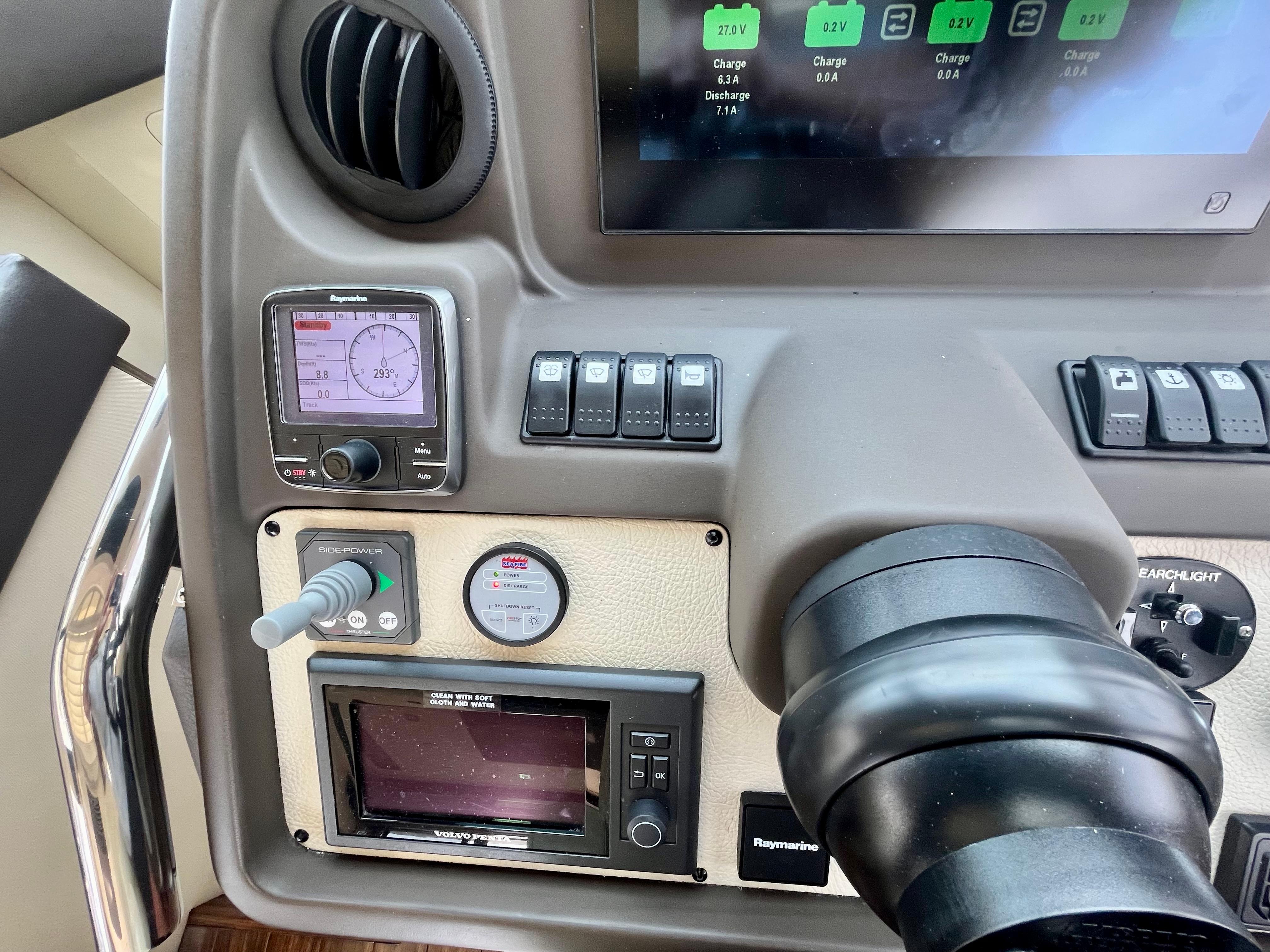 Control panel of a 2014 Azimut 55S yacht with navigation and monitoring systems.
