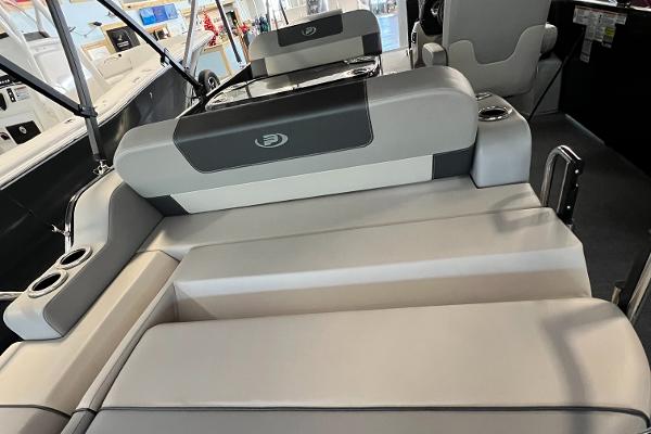 2024 Princecraft Quorum 23 RL boat interior with plush seating and cup holders.