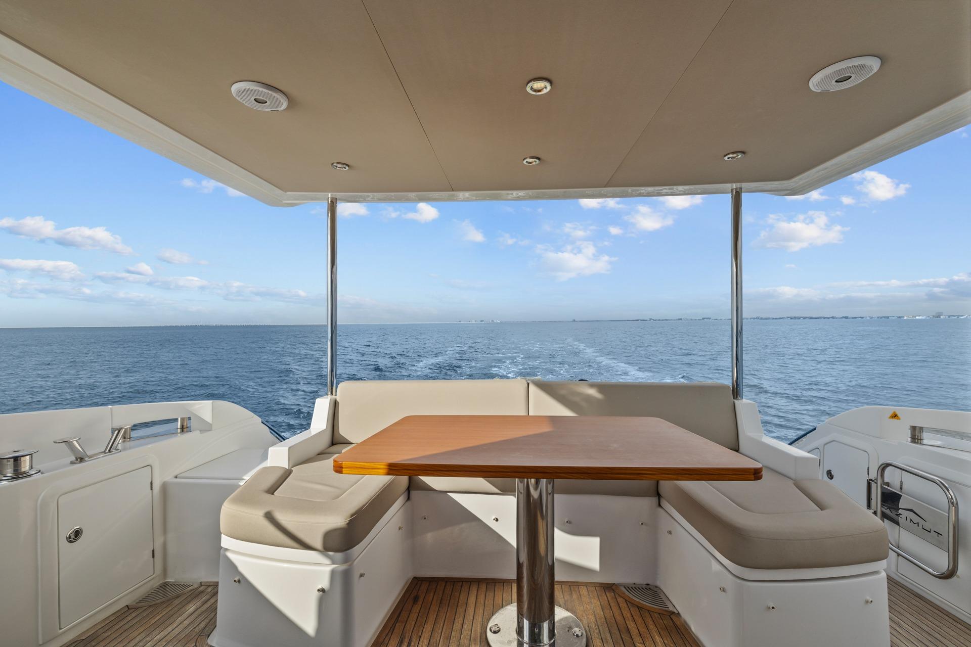 Azimut 55 yacht deck with seating and ocean view, 2019 model.