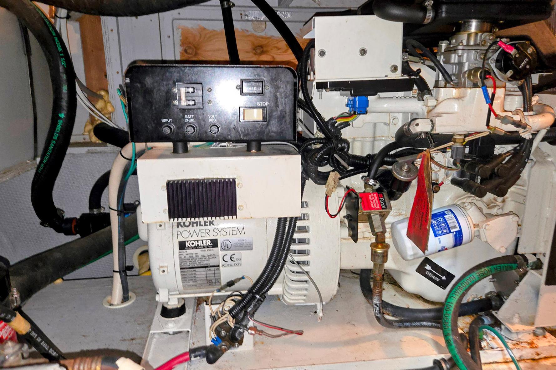 Engine room of a 2003 Silverton 392 Motor Yacht with Kohler power system.