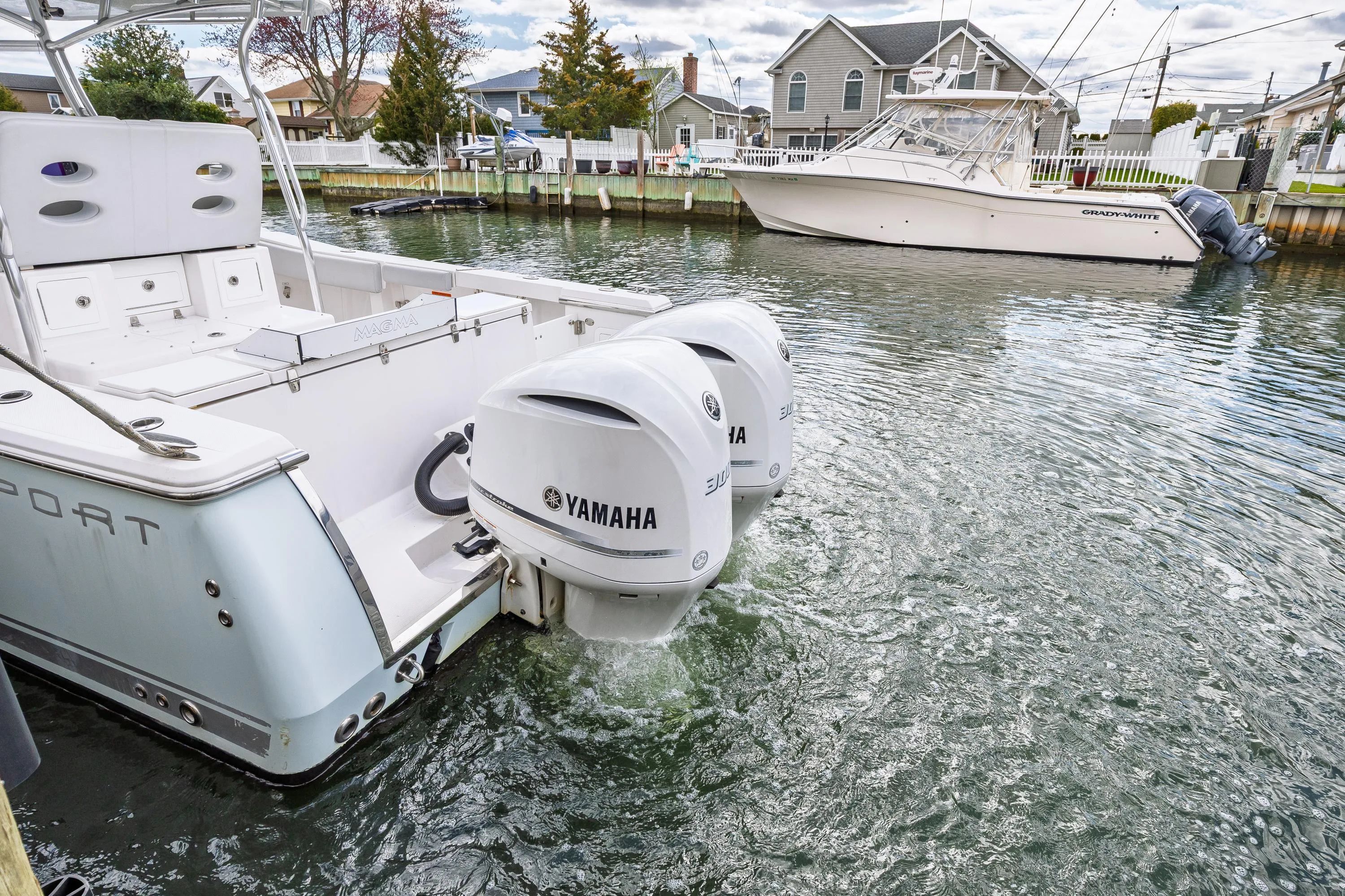 2018 Southport 29 FE boat with Yamaha engines in water.