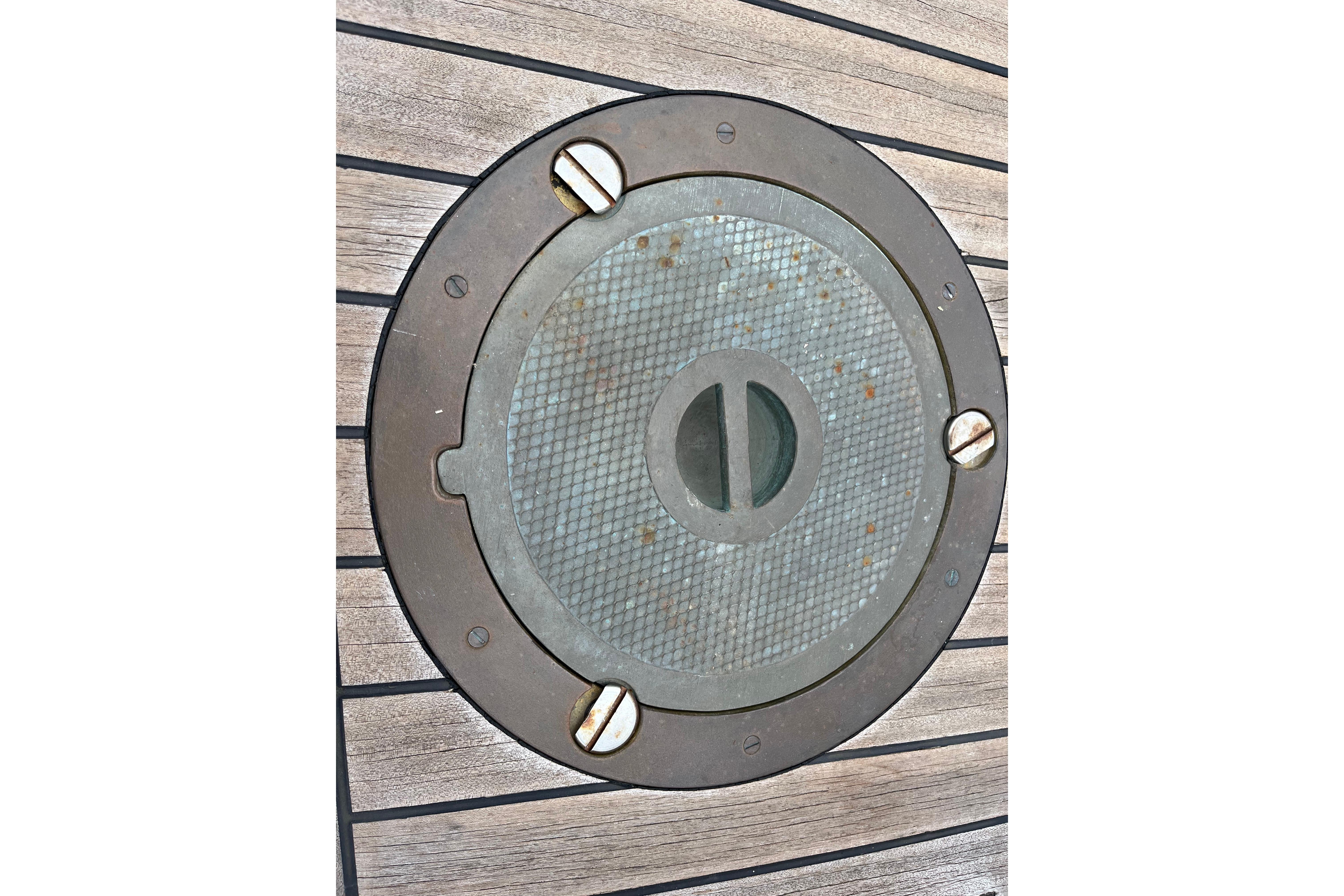 Round metal hatch on 1947 Murray Peterson Schooner deck.
