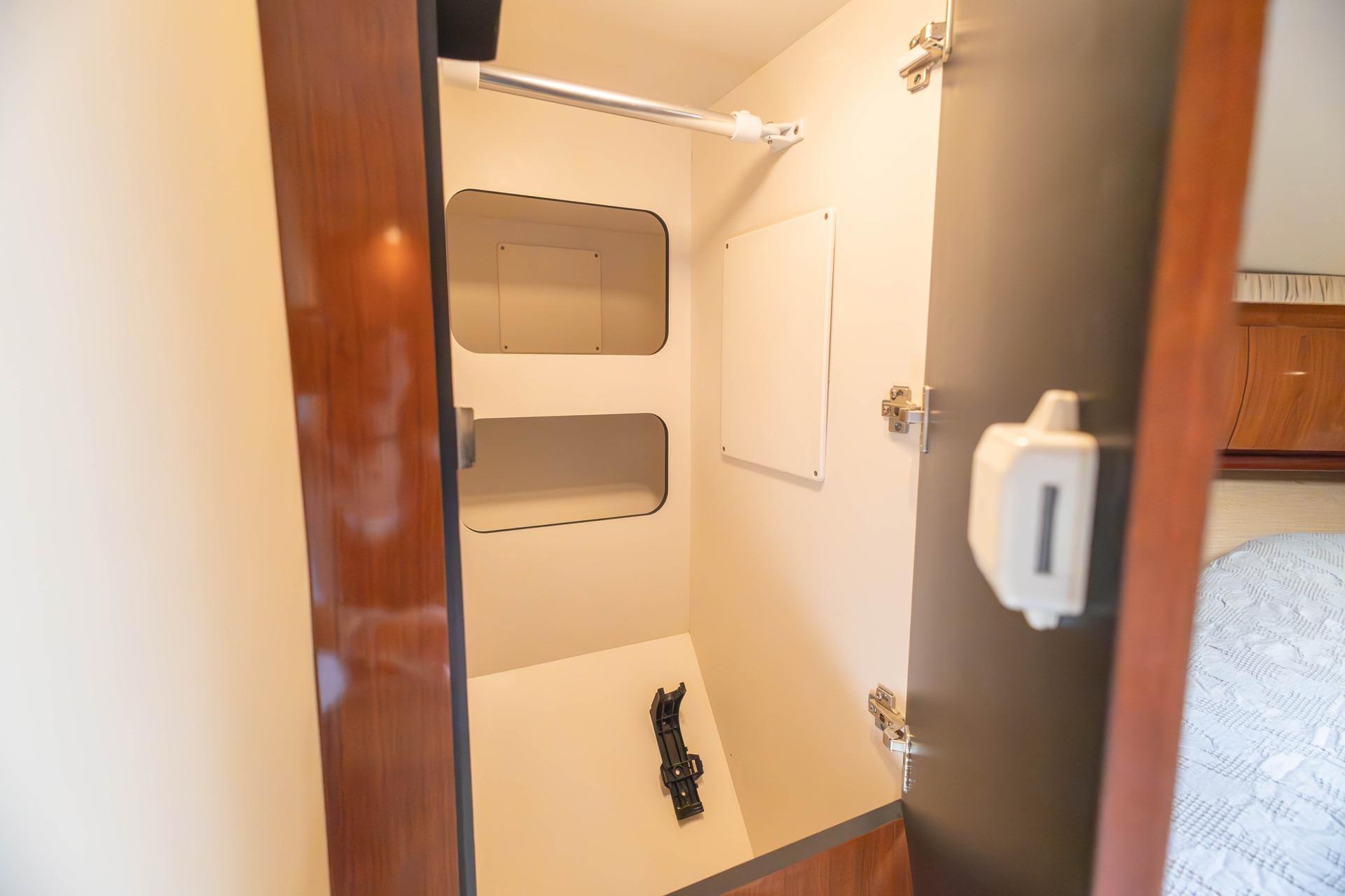Interior storage compartment on a 2005 Sea Ray 420 Sundancer yacht.