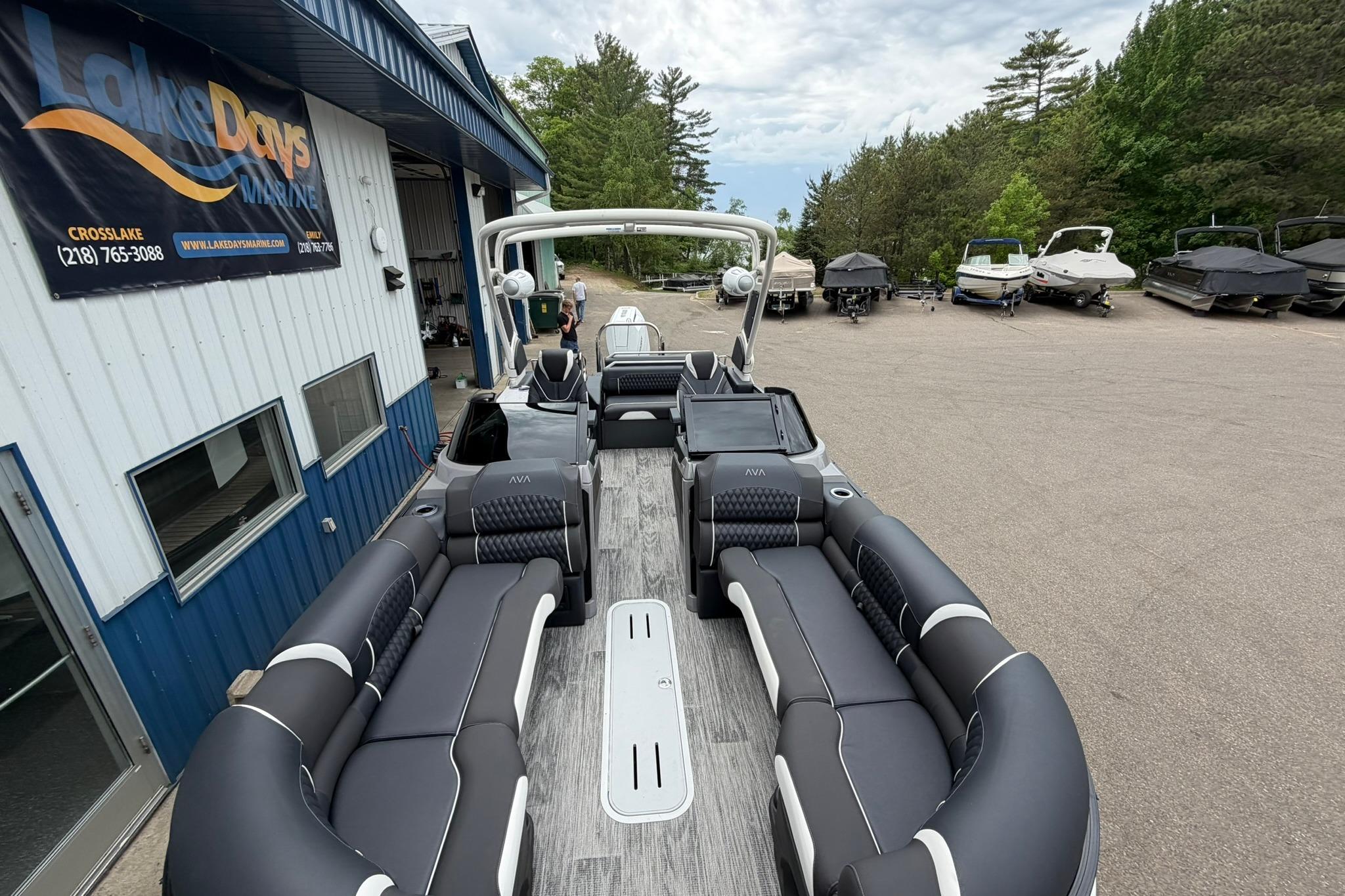 Luxurious 2026 Avalon Excalibur LTD Flex Lounge boat at Lake Days Marine dealership.