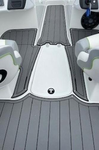 2024 Tahoe 210 Si boat interior with gray flooring and white seats.