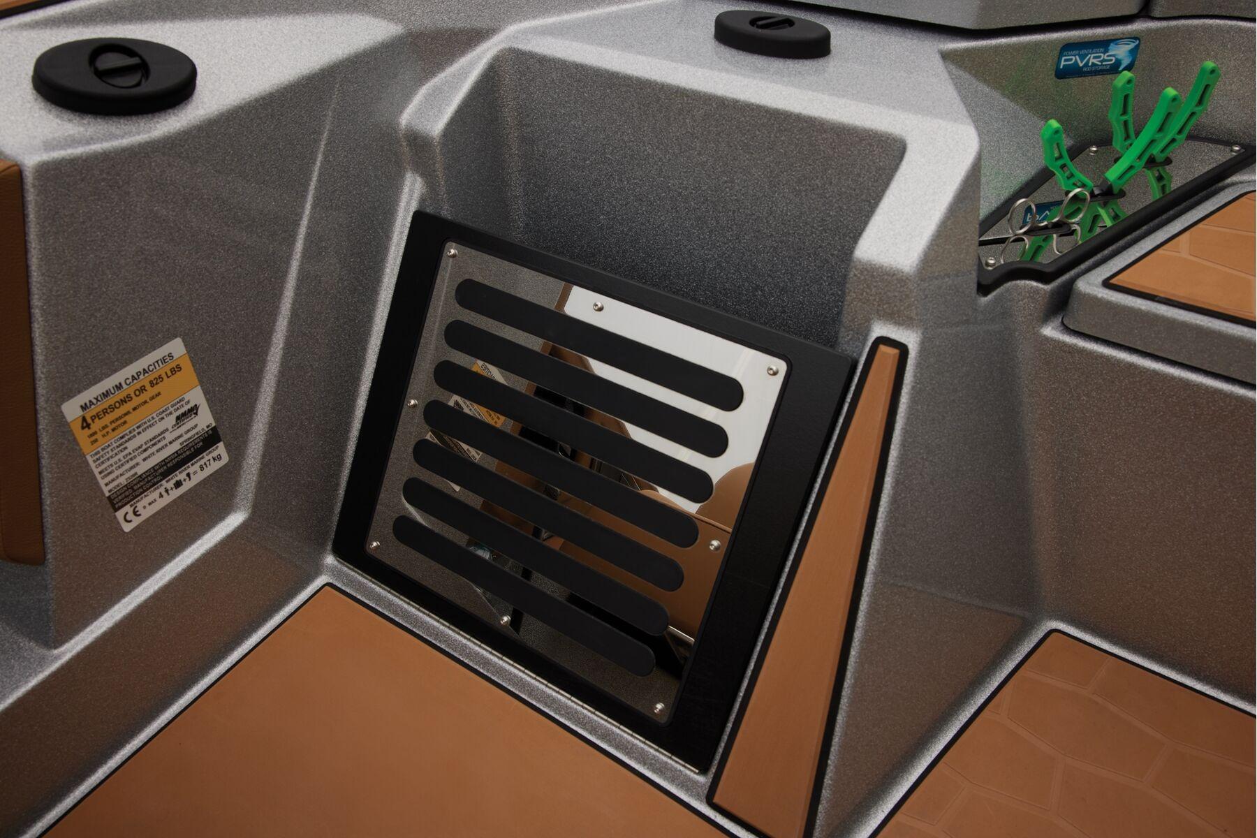 Manufacturer Provided Image: 2026 Ranger Z520R Ultra boat interior with storage compartment and capacity label.