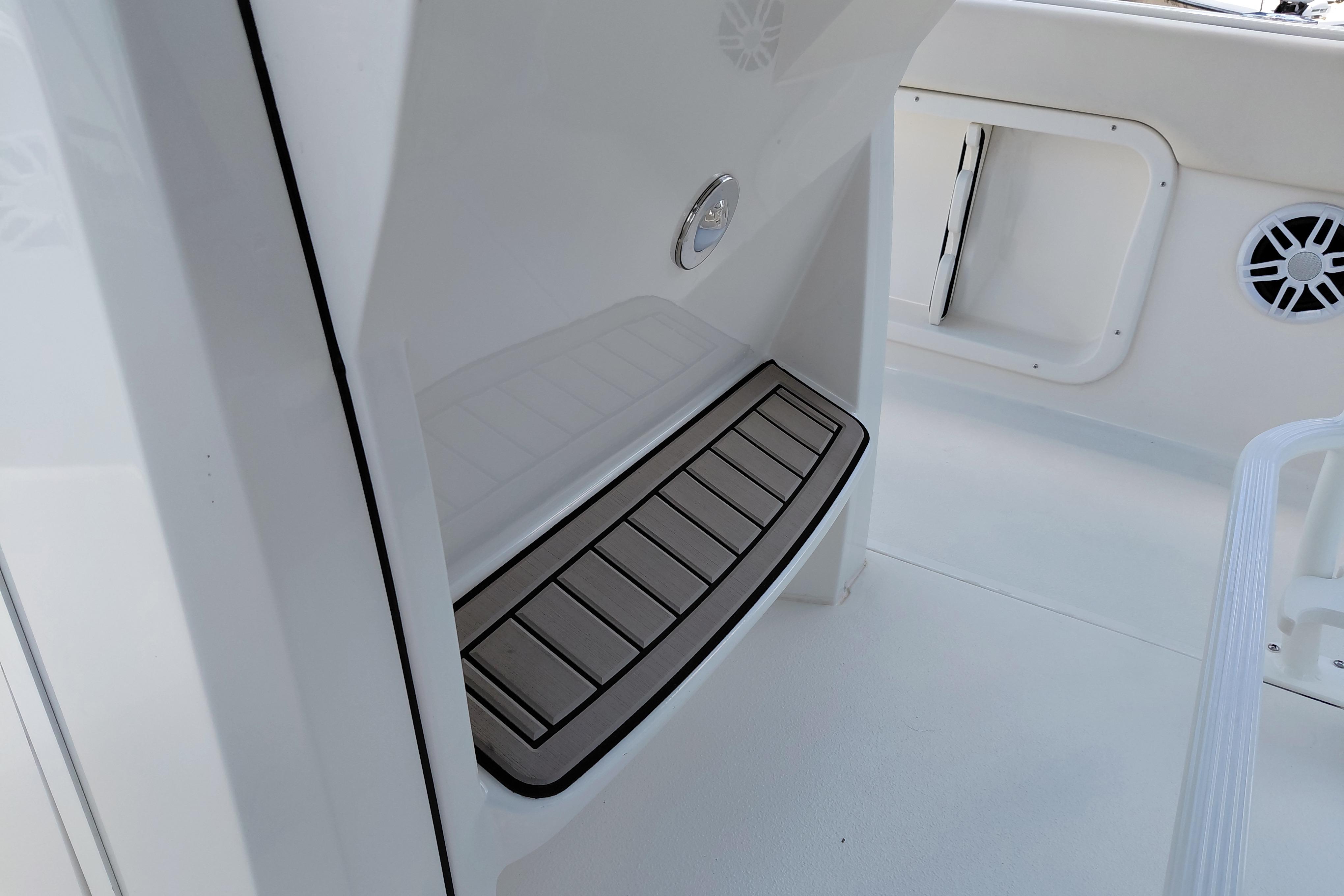2023 Stingray 206 CC boat interior with sleek white design and modern features.