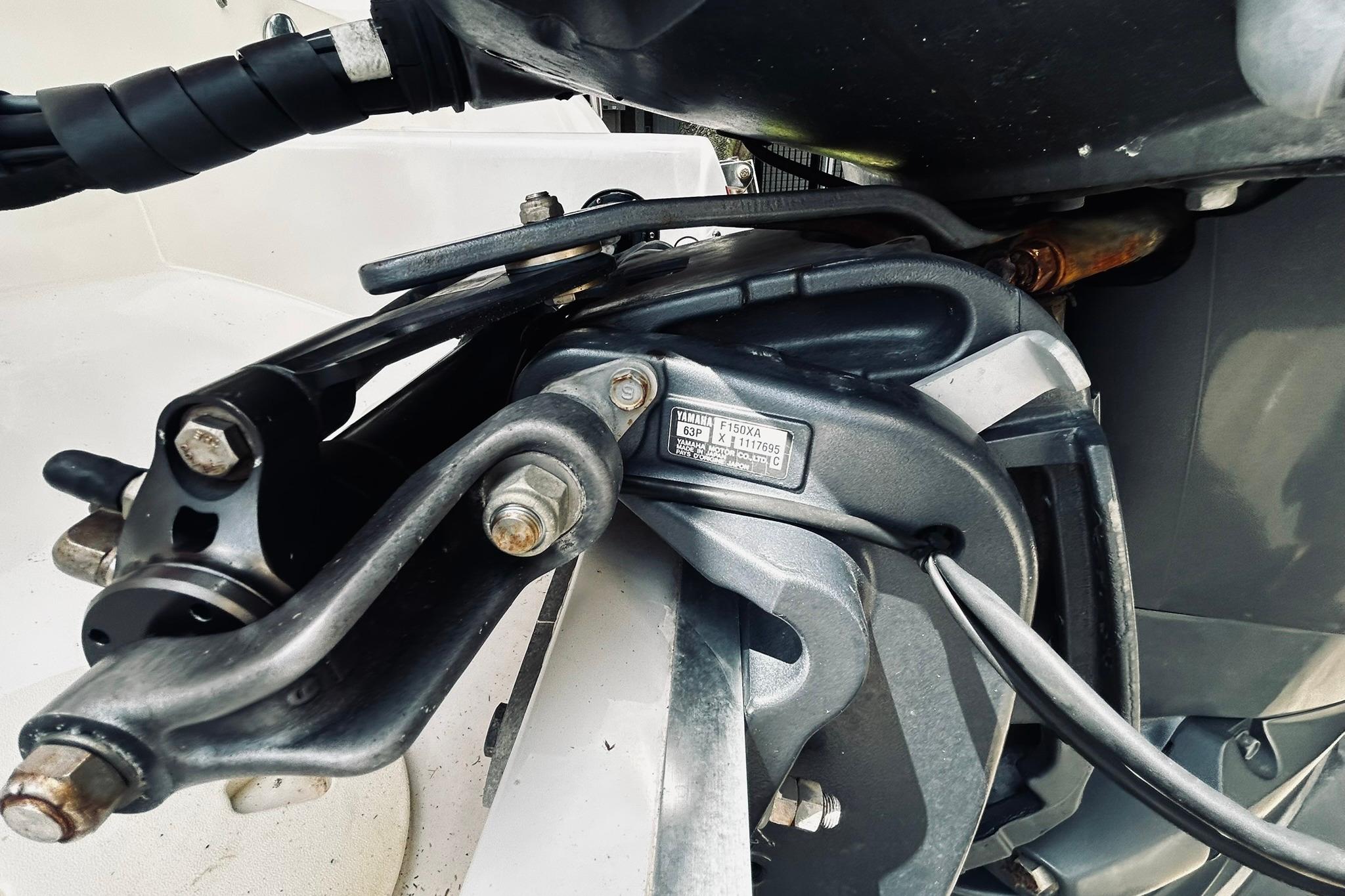 Close-up of a 2013 Hurricane SunDeck Sport 201 OB boat engine component.