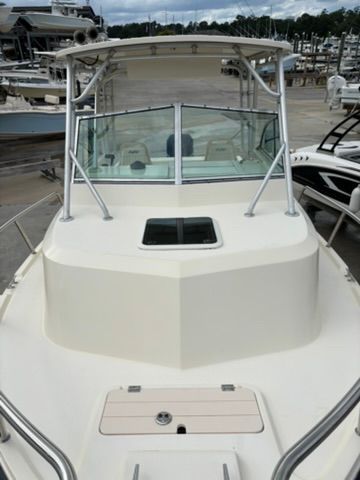 2008 Parker 2310 Walkaround at the marina, featuring a spacious deck and sturdy railings.