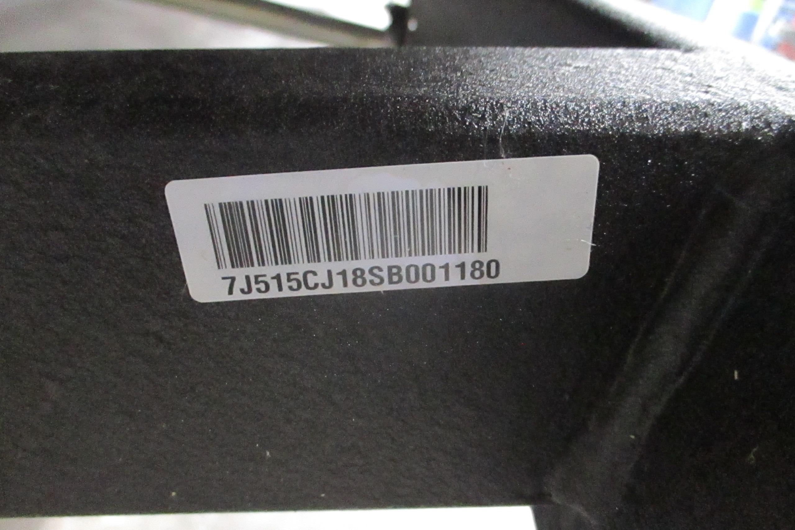 Barcode label on 2025 Tahoe T18 with serial number 7J515CJ18SB001180.