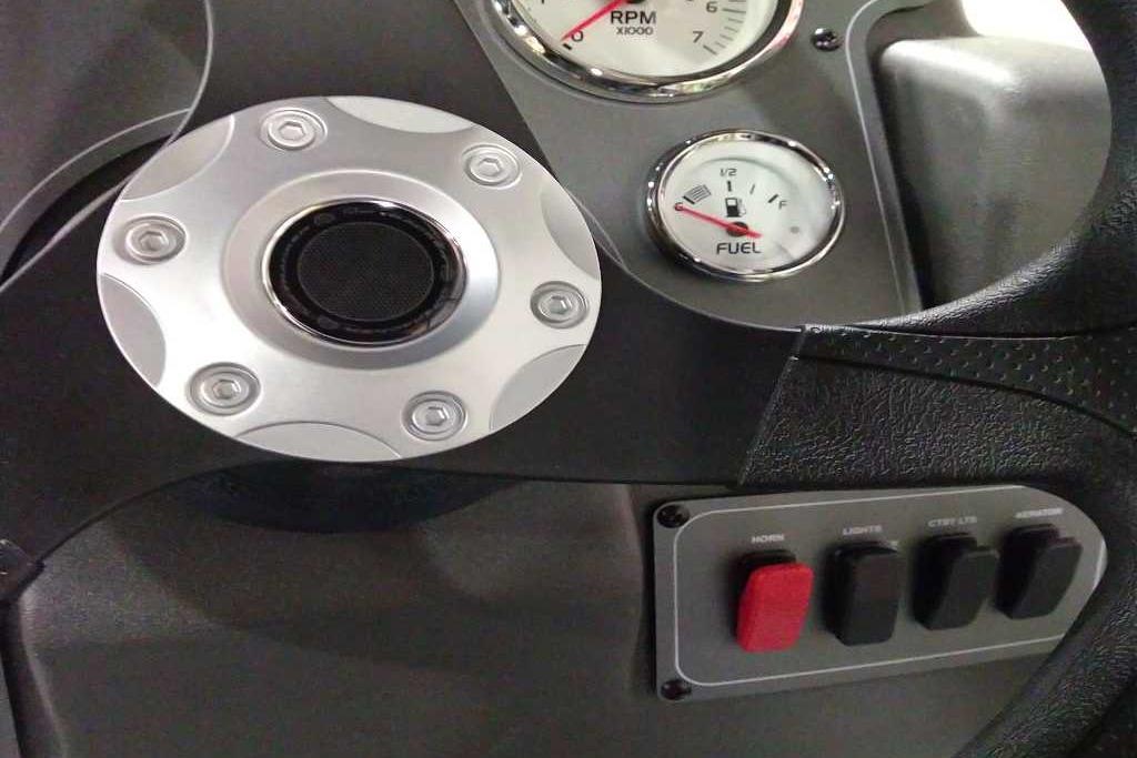 Steering wheel and dashboard of 2026 Sun Tracker Bass Buggy 18 DLX boat.