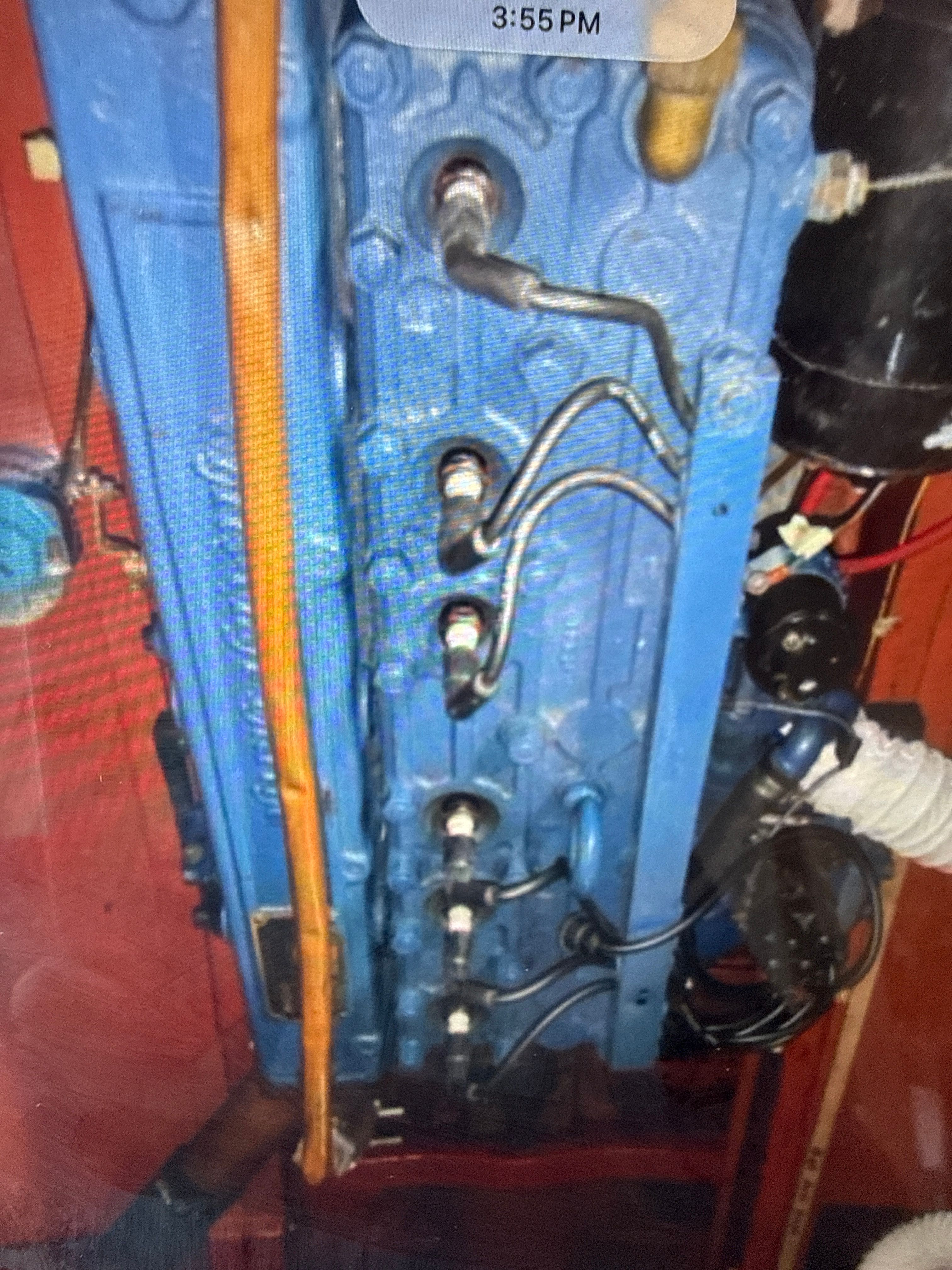 1940 Chris-Craft Barrelback engine, blue-painted, detailed view.