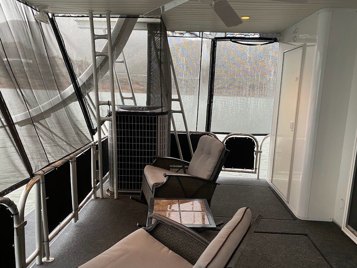Interior of a 2006 Summersun Houseboats 16x68 with seating area.