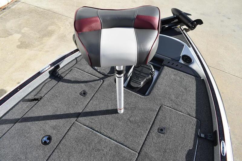 2026 Triton 179 TrX boat deck with cushioned seat and storage compartments.
