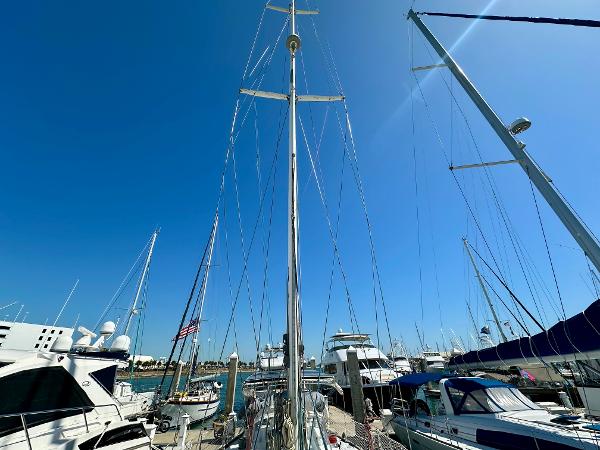 Concordia 52 sailboat from 1989 docked at a marina under a clear blue sky.