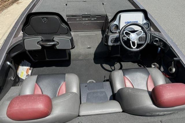 2013 Skeeter FX21 boat interior with dual seats and steering console.