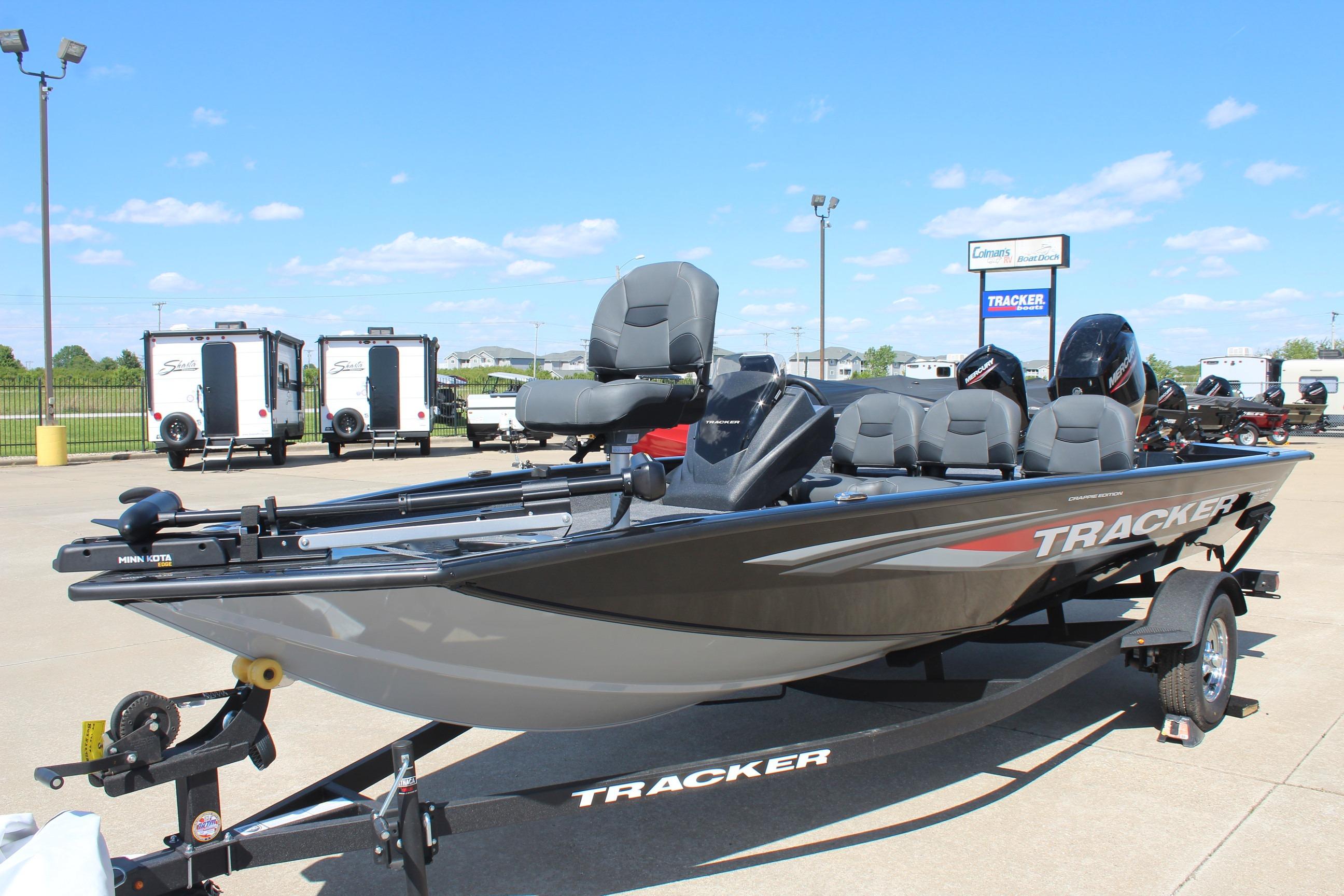 2026 Tracker Pro Team 175 Crappie Edition boat on trailer, outdoor dealership display.