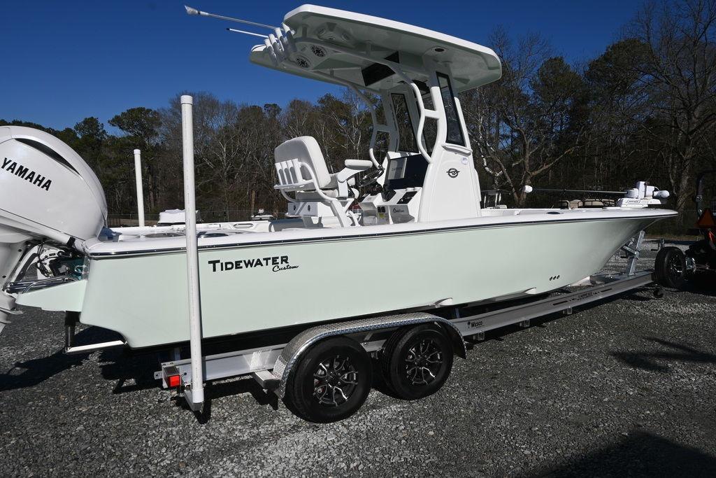 2026 Tidewater 2500 Carolina Bay boat on trailer, featuring Yamaha engine, parked outdoors.