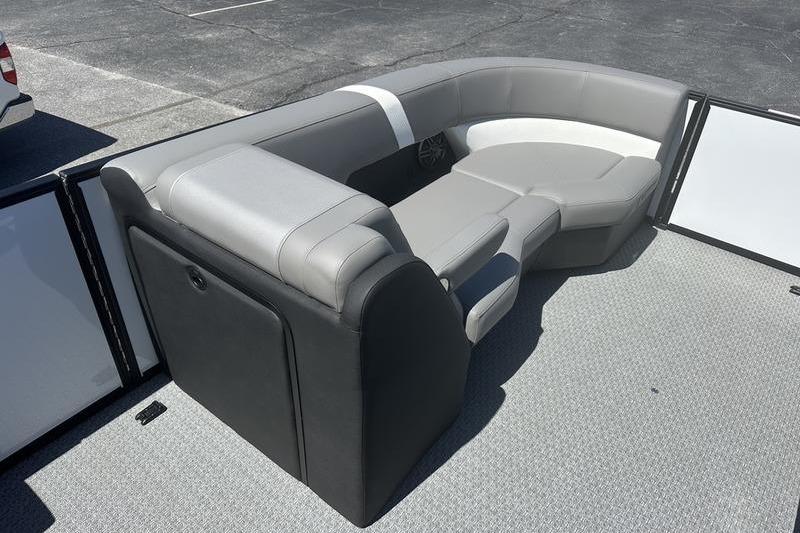 Luxurious seating on 2026 Evotti 523QL boat, featuring sleek gray and white upholstery.