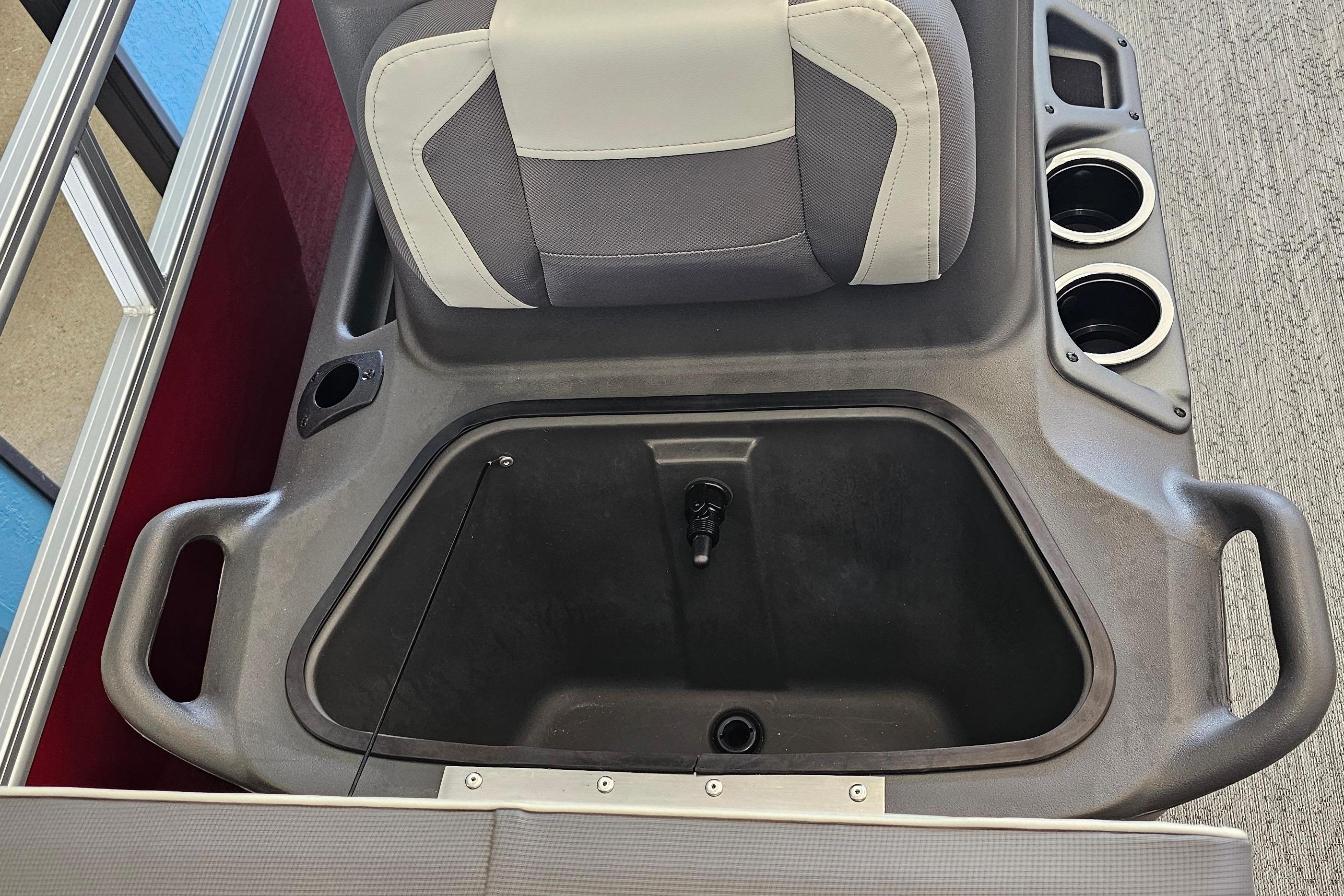 2026 Sun Tracker Bass Buggy 16 XL Select interior with storage compartment and cup holders.