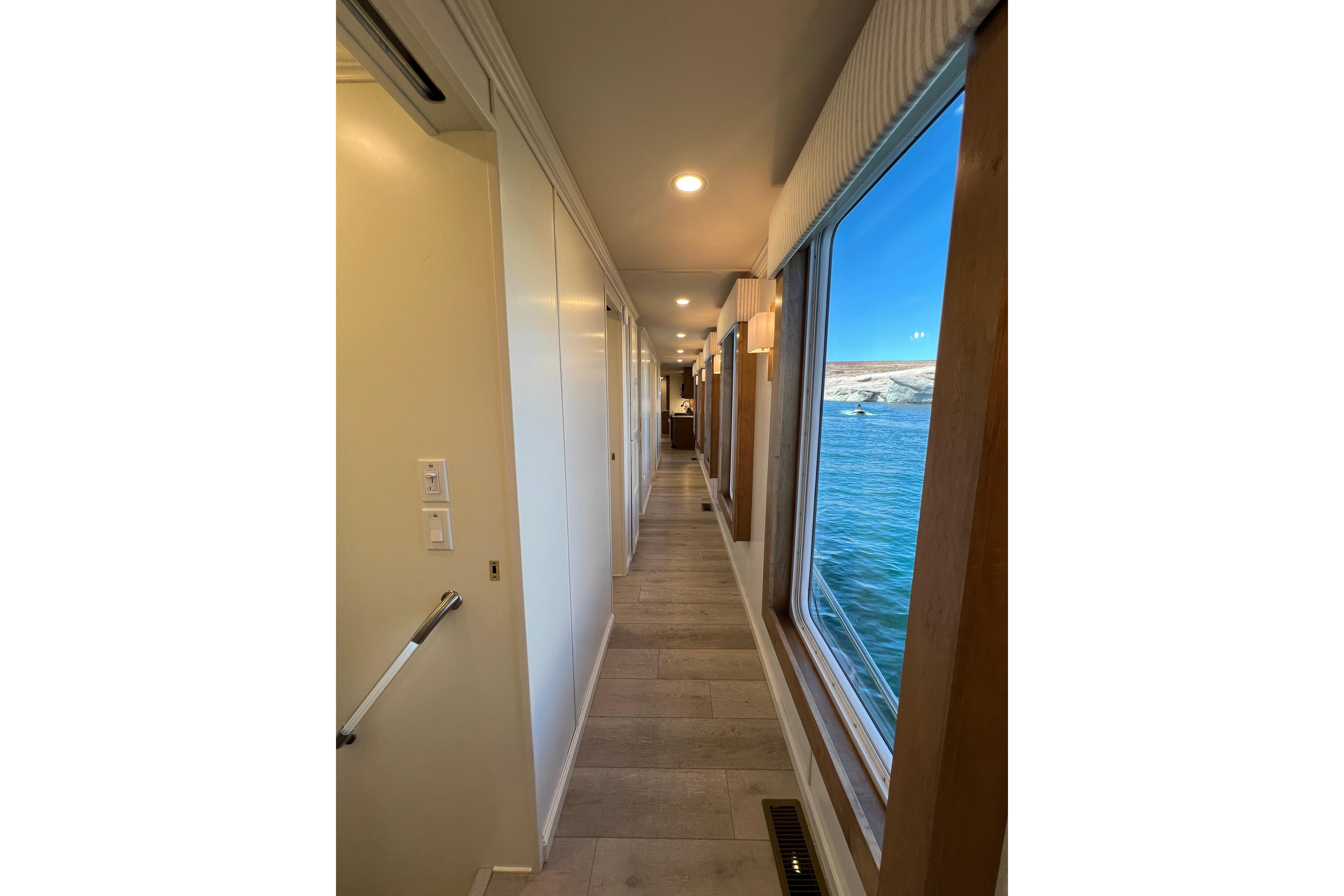 Luxurious hallway view inside 2025 Sumerset Excellence Multiple Shares houseboat.