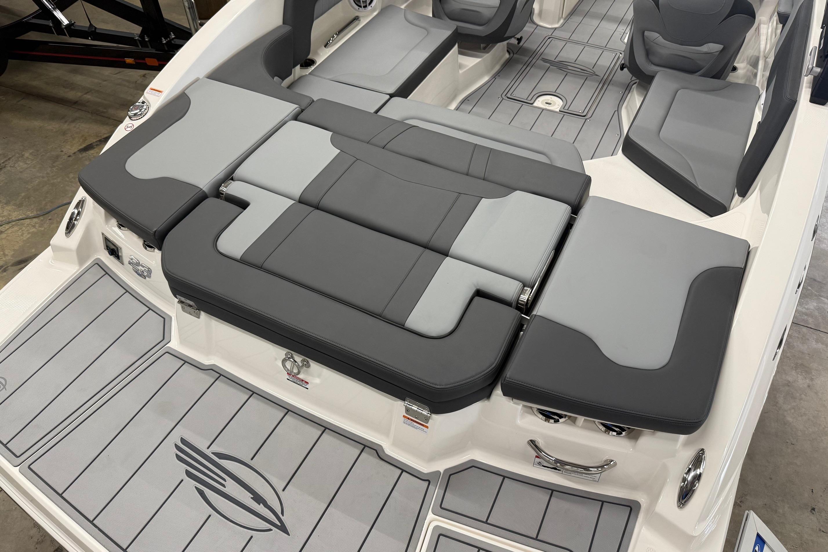 2026 Chaparral 23 SSi boat interior with gray seating and sleek design.
