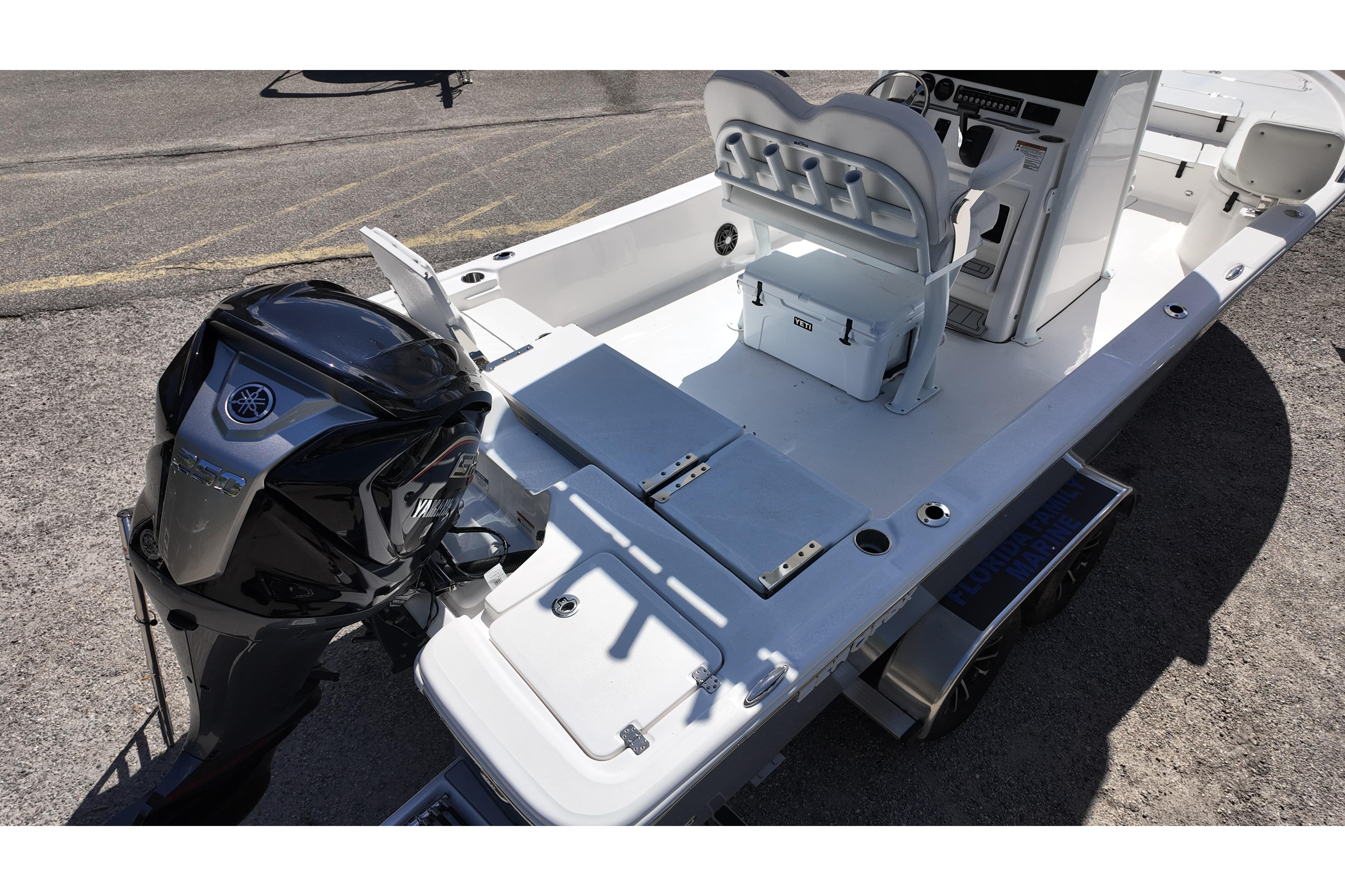 2026 Sea Fox 251 Bay Fox boat with Yamaha outboard engine, featuring spacious deck layout.