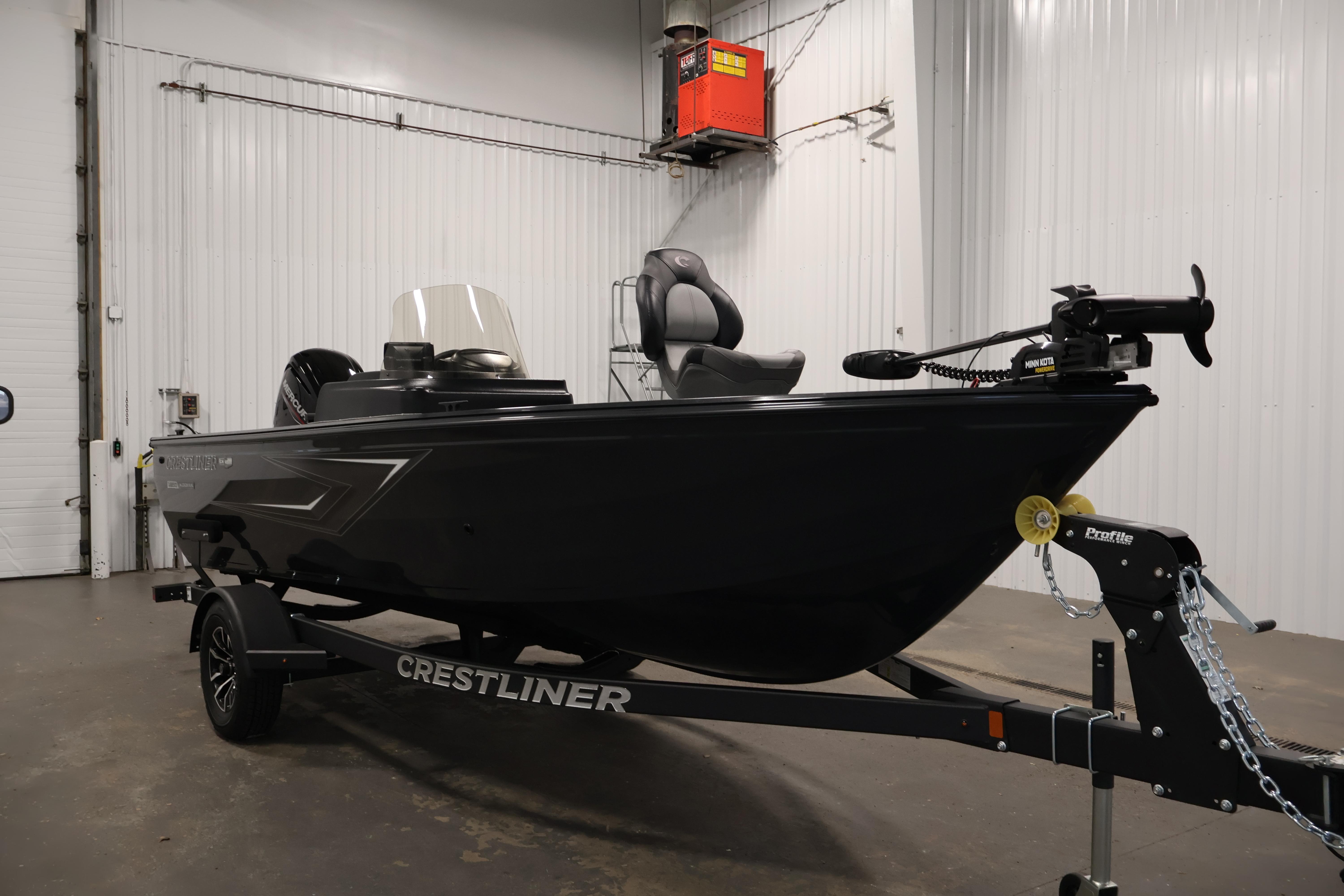 2026 Crestliner 1850 Kodiak SC boat on trailer in indoor setting.