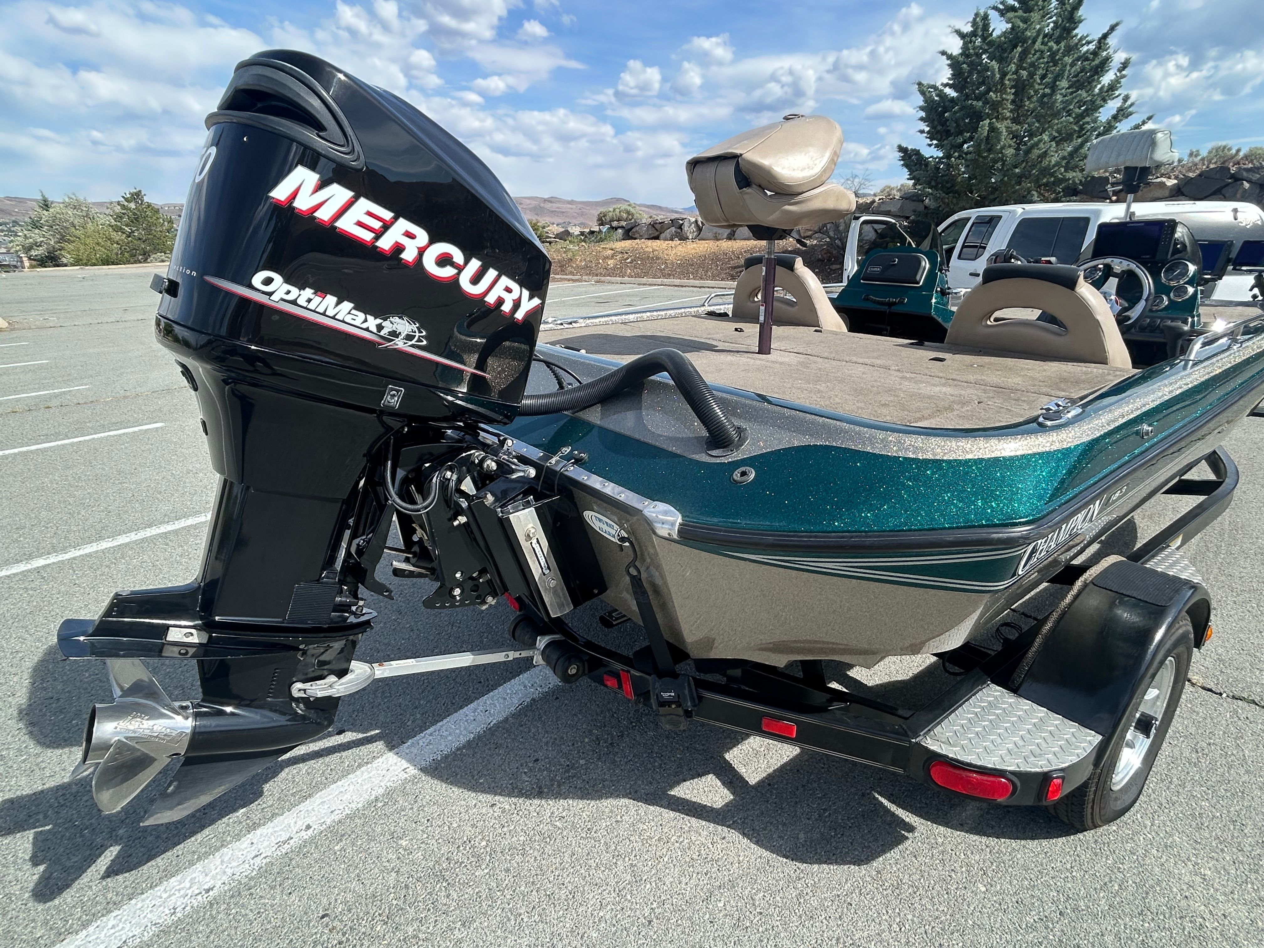 2008 Champion 183 boat with Mercury OptiMax engine.