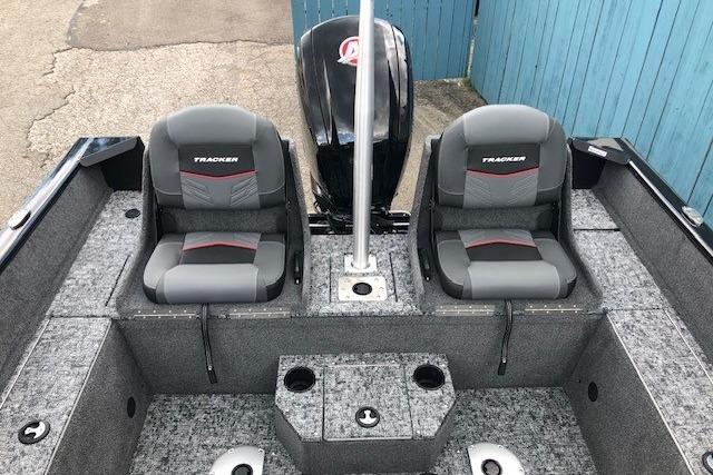 2026 Tracker Pro Guide V-175 Combo boat interior with dual seats and motor.