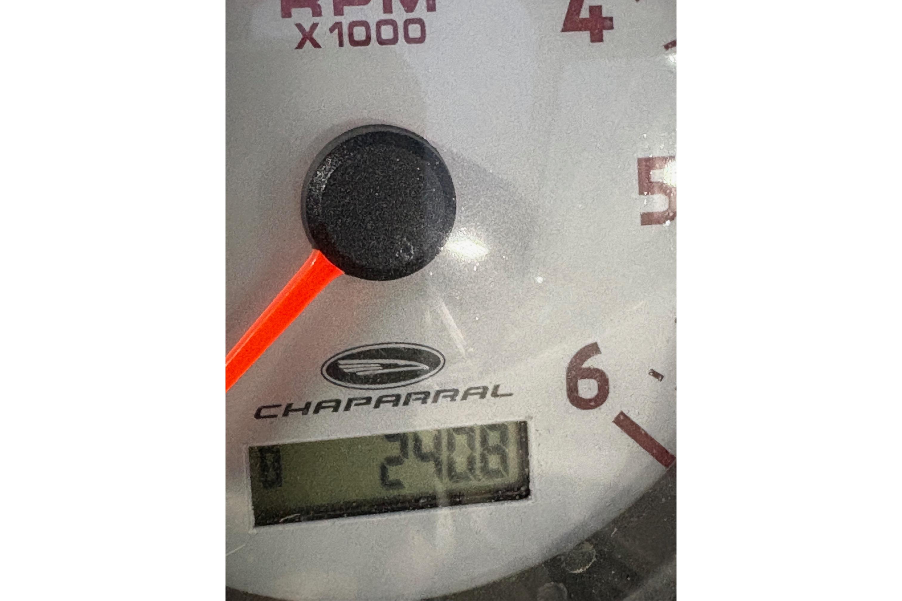 Close-up of a Chaparral 216 SSi 2011 tachometer displaying 241 hours.
