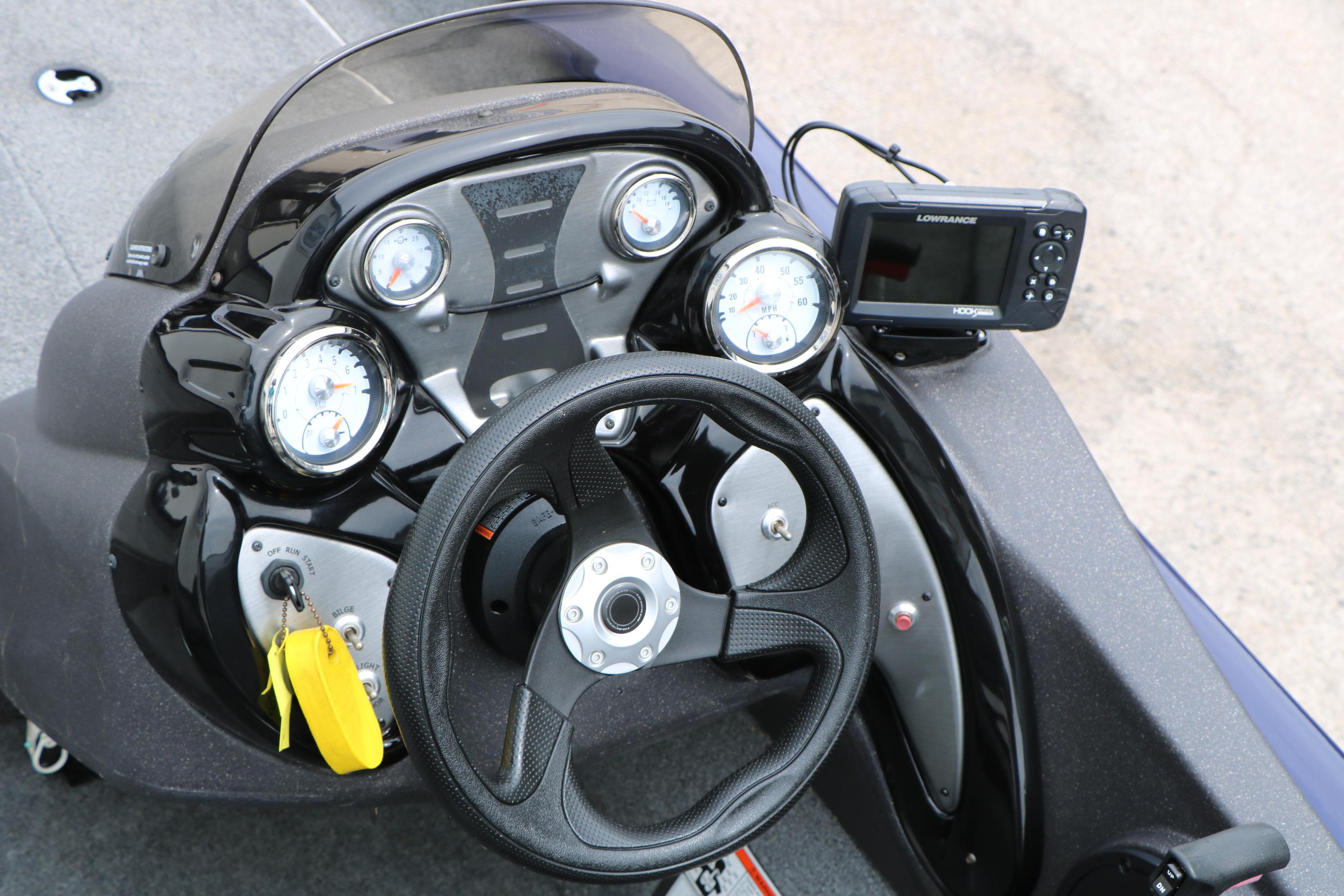 2022 Tracker Pro Team 175 TF dashboard with steering wheel and gauges.